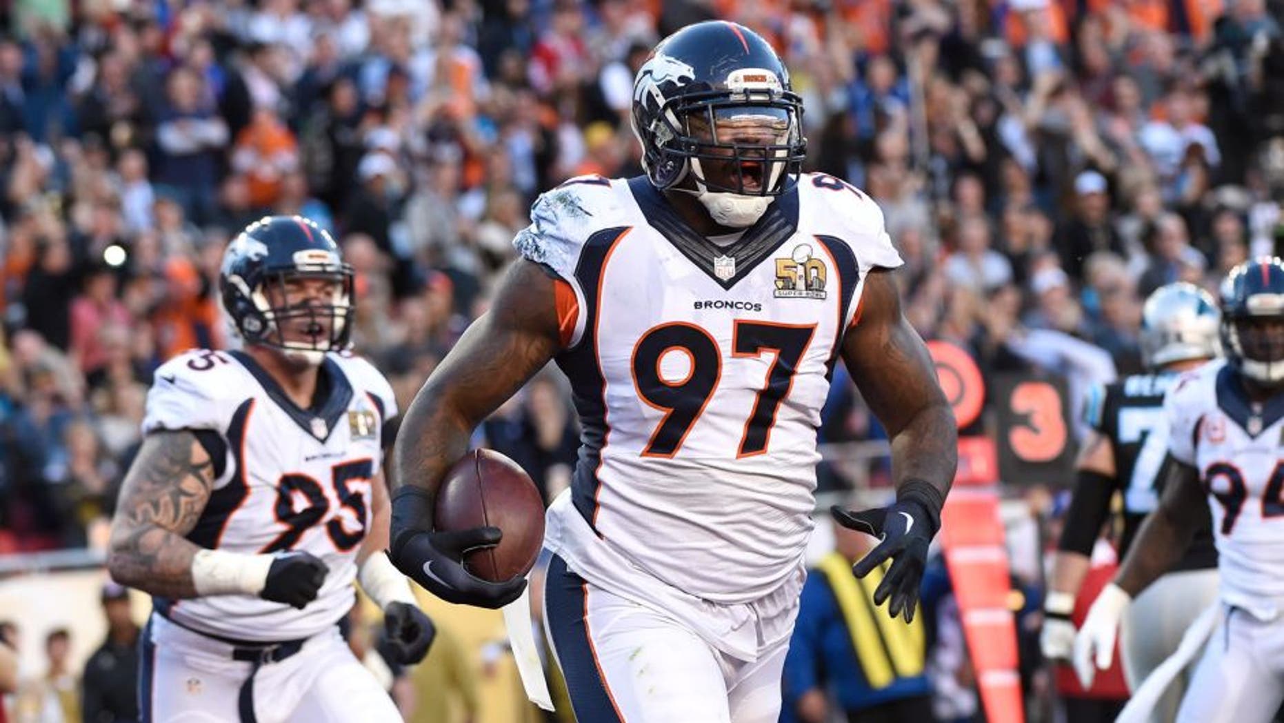 SANTA CLARA, CA - FEBRUARY 07: Malik Jackson (97) of the Denver Broncos celebrates his touchdown after recovering a fumble in the first quarter. The Denver Broncos played the Carolina Panthers in Super Bowl 50 at Levi's Stadium in Santa Clara, Calif. on February 7, 2016. (Photo by Joe Amon/The Denver Post via Getty Images)