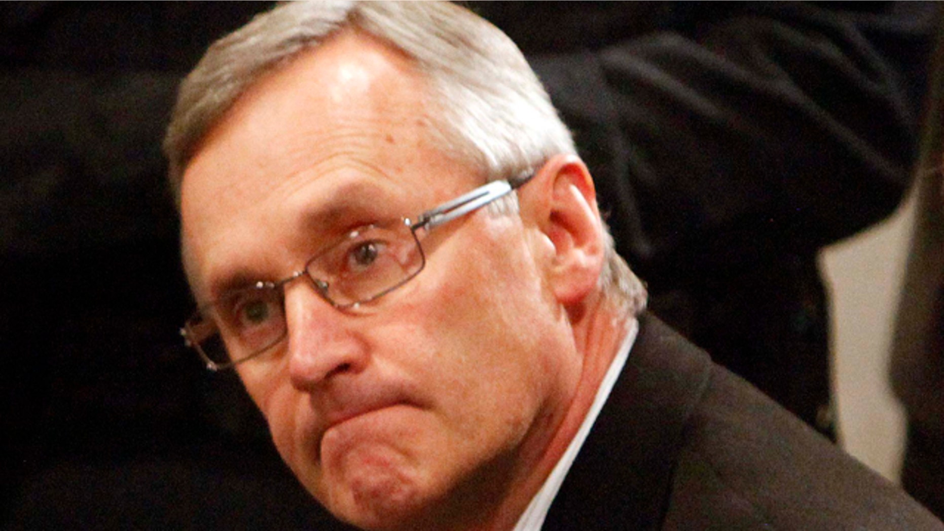 March 8: Ohio State football coach Jim Tressel, left, sits next to E. Gordon Gee, Ohio State University president, during a news conference in Columbus, Ohio.