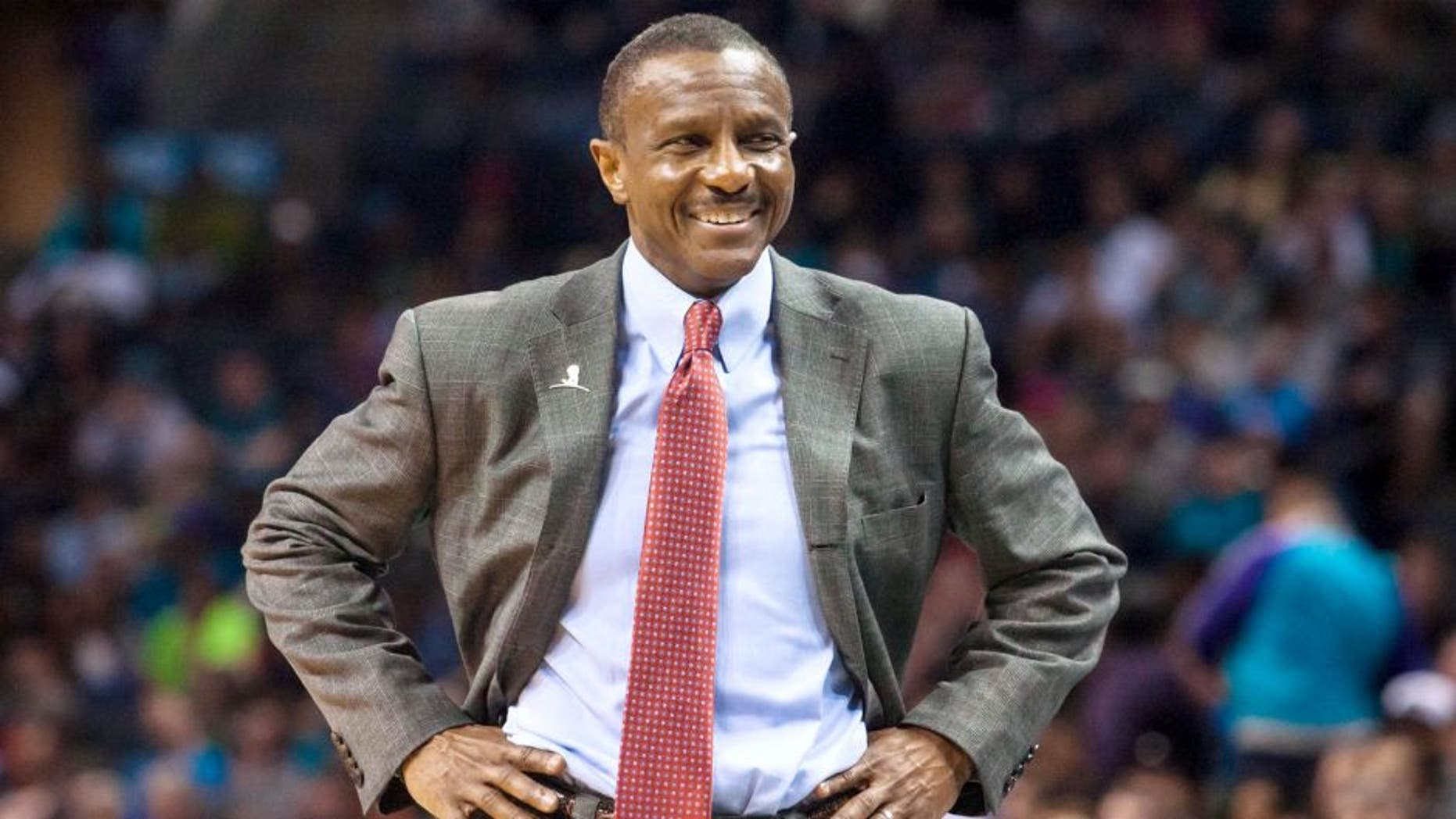 Mar 6, 2015; Charlotte, NC, USA; Toronto Raptors head coach Dwane Casey reacts after a foul call during the second half against the Charlotte Hornets at Time Warner Cable Arena. The Hornets defeated the Raptors 103-94. Mandatory Credit: Jeremy Brevard-USA TODAY Sports