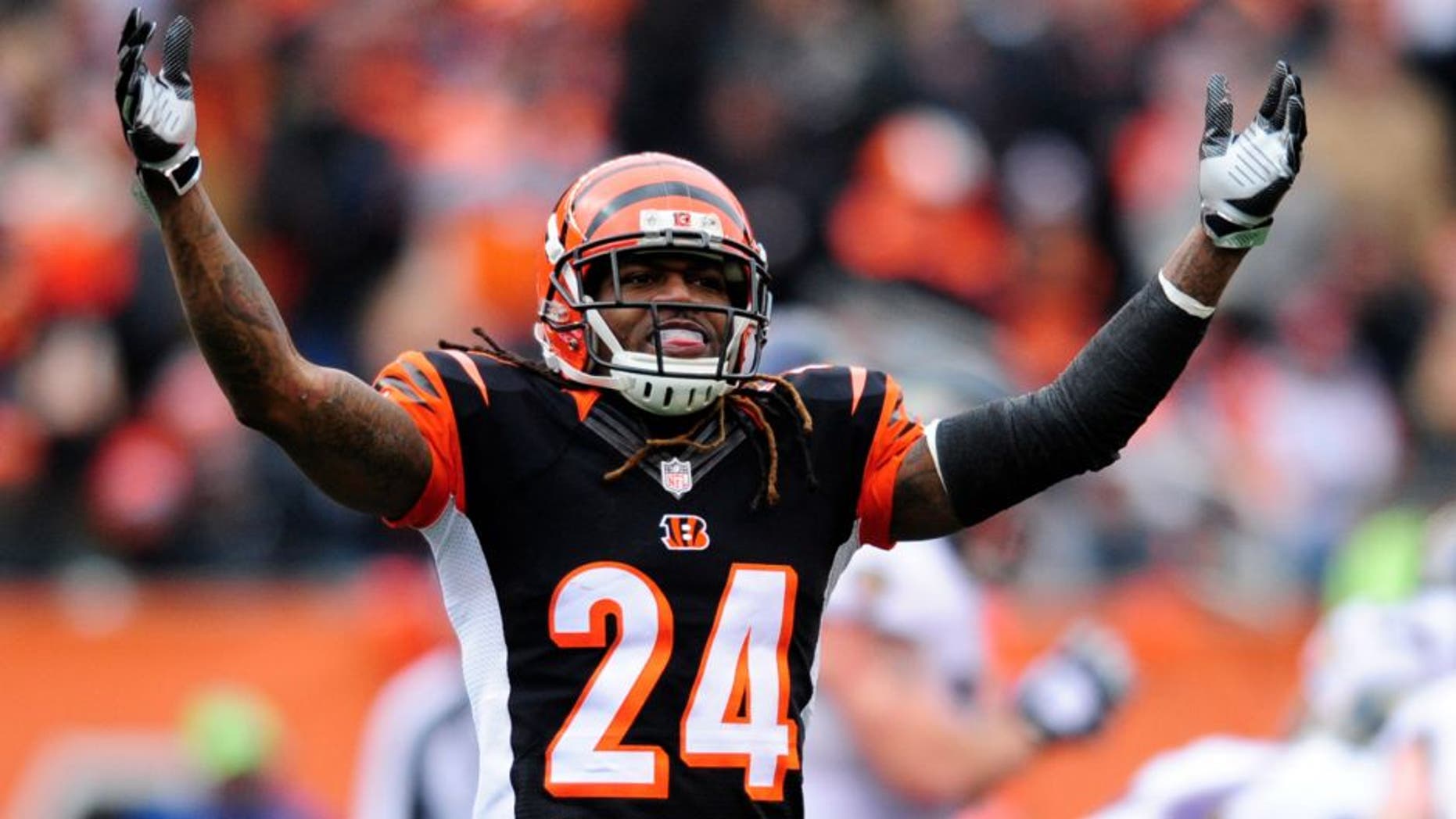 Jan 3, 2016; Cincinnati, OH, USA; Cincinnati Bengals cornerback Adam Jones (24) waves his arms during the first quarter against Baltimore Ravens at Paul Brown Stadium. Mandatory Credit: Joshua Lindsey-USA TODAY Sports