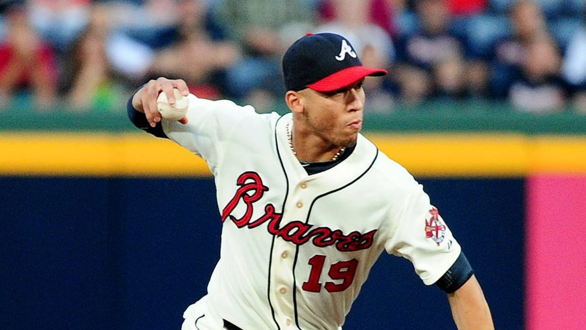 ATLANTA, GA - SEPTEMBER 14: Andrelton Simmons #19 of the Atlanta Braves makes a throw against the San Diego Padres at Turner Field on September 14, 2013 in Atlanta, Georgia. (Photo by Scott Cunningham/Getty Images)