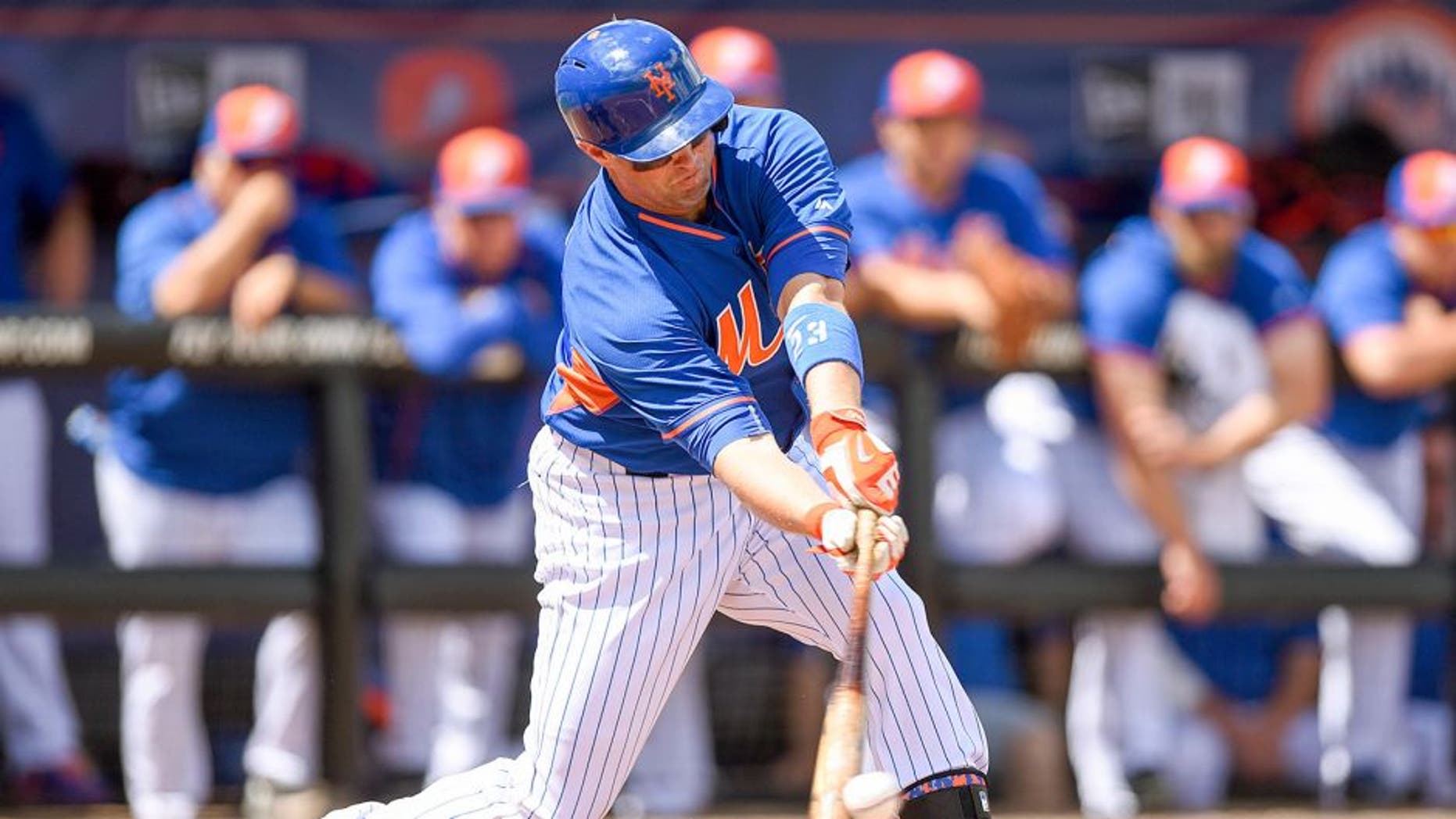 Mar 12, 2015; Port St. Lucie, FL, USA; New York Mets right fielder Michael Cuddyer (23) gets a single on a two strike count against the Washington Nationals at Tradition Field. Mandatory Credit: Brad Barr-USA TODAY Sports