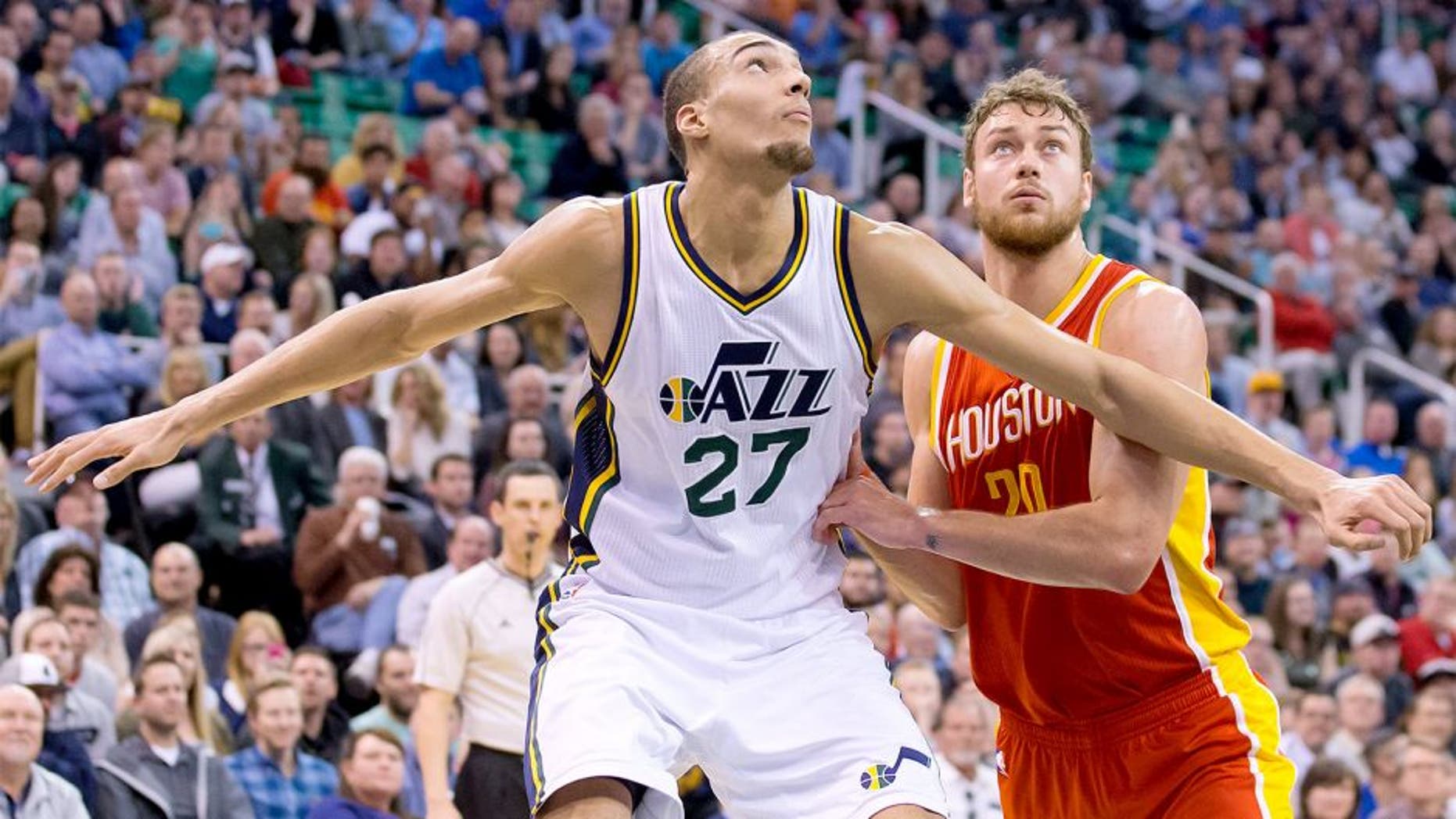 Mar 12, 2015; Salt Lake City, UT, USA; Utah Jazz center Rudy Gobert (27) boxes out Houston Rockets forward Donatas Motiejunas (20) during the first half at EnergySolutions Arena. Mandatory Credit: Russ Isabella-USA TODAY Sports