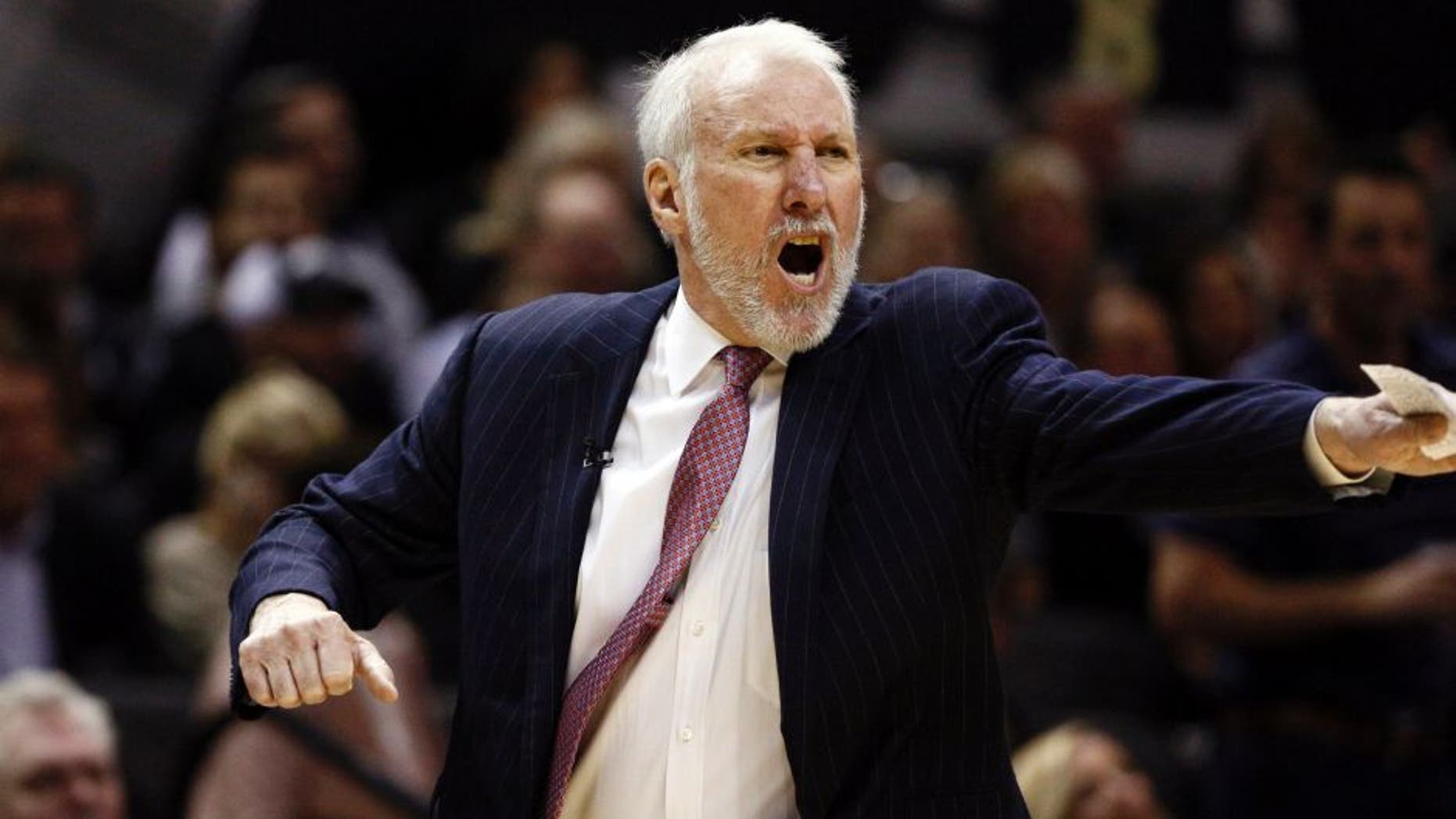 Mar 12, 2015; San Antonio, TX, USA; San Antonio Spurs head coach Gregg Popovich gives direction to his team during the second half against the Cleveland Cavaliers at AT&T Center. Mandatory Credit: Soobum Im-USA TODAY Sports
