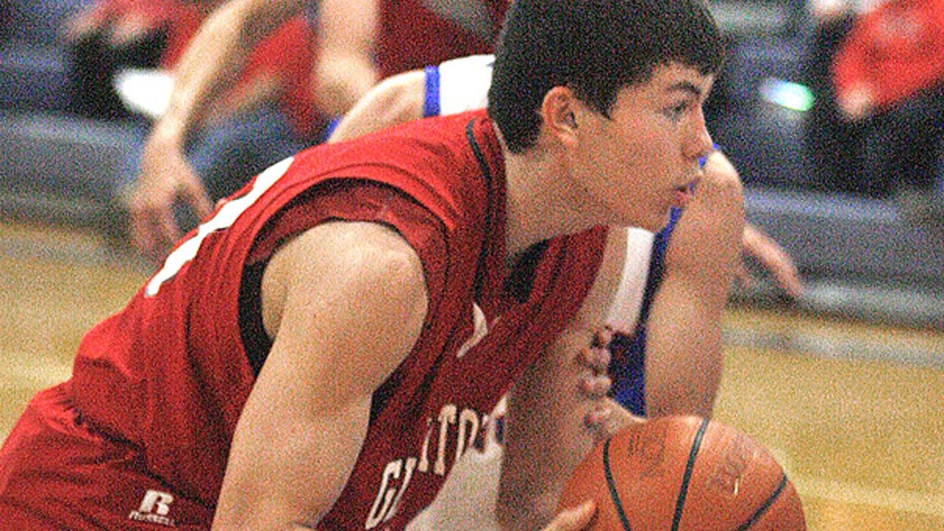 In this Feb. 1, 2011, photo, Roma High School's Robert Garza moves to the net in a game with with Veterans Memorial High School in Mission, Texas.