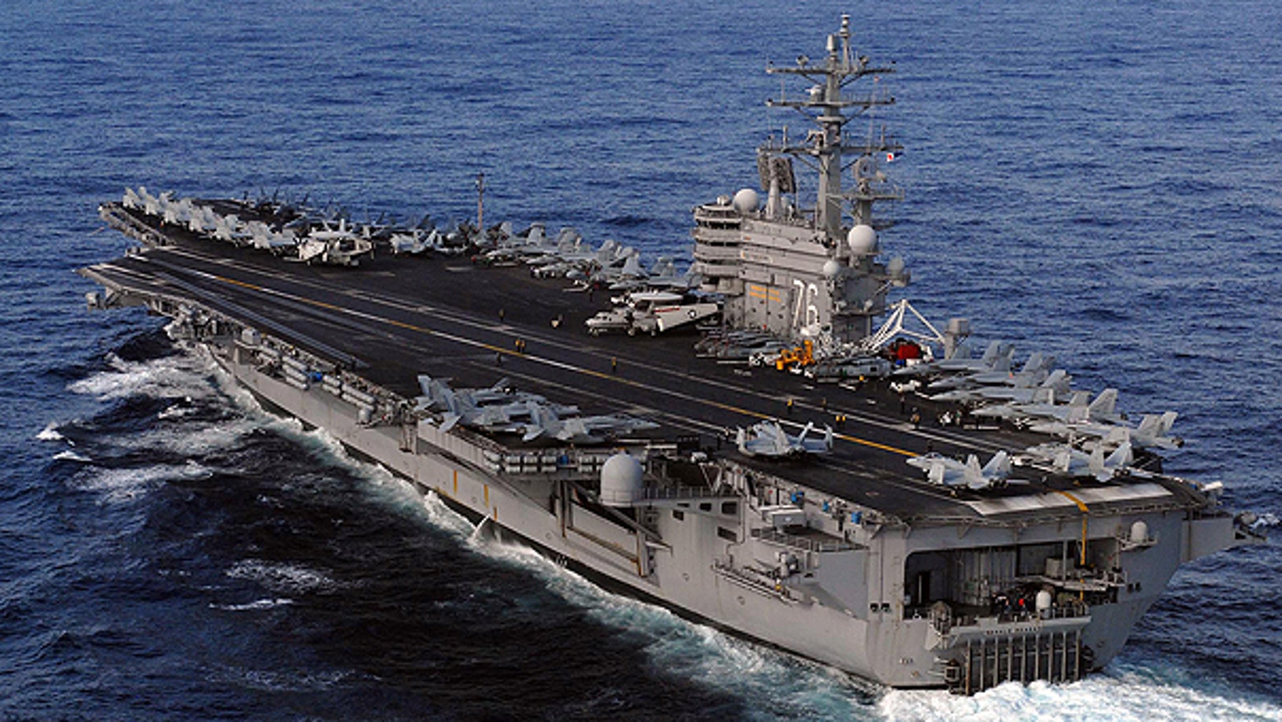March 12: This image provided by the U.S. Navy shows the Nimitz-class aircraft carrier, USS Ronald Reagan underway in the Pacific Ocean en route to Japan to render humanitarian assistance and disaster relief.
