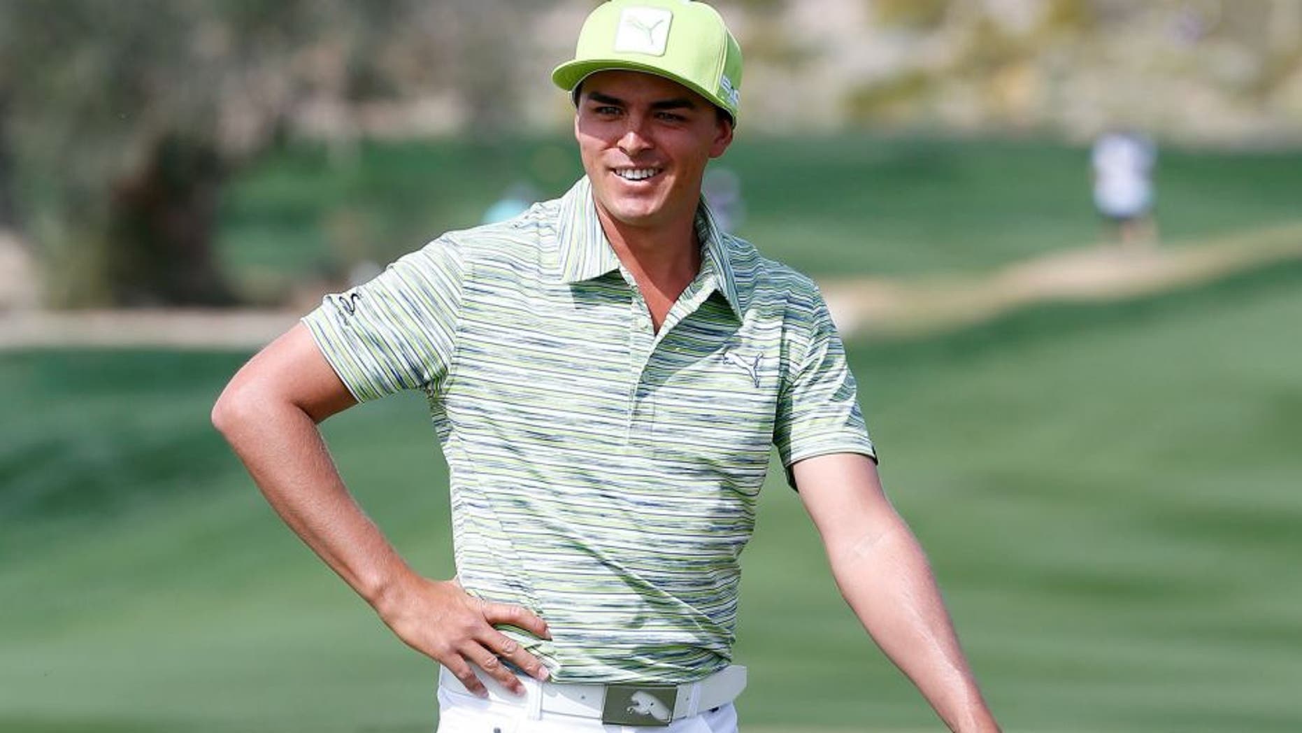 MARANA, AZ - FEBRUARY 21: Rickie Fowler plays a shot during the third round of the World Golf Championships - Accenture Match Play Championship at The Golf Club at Dove Mountain on February 21, 2014 in Marana, Arizona. (Photo by Sam Greenwood/Getty Images)