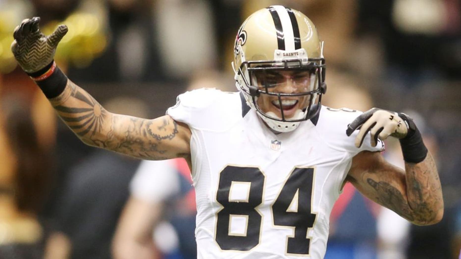 Sep 21, 2014; New Orleans, LA, USA; New Orleans Saints wide receiver Kenny Stills (84) congratulates wide receiver Marques Colston (12) after a touchdown in the fourth quarter against the Minnesota Vikings at the Mercedes-Benz Superdome. New Orleans defeated the Vikings 20-9. Mandatory Credit: Crystal LoGiudice-USA TODAY Sports