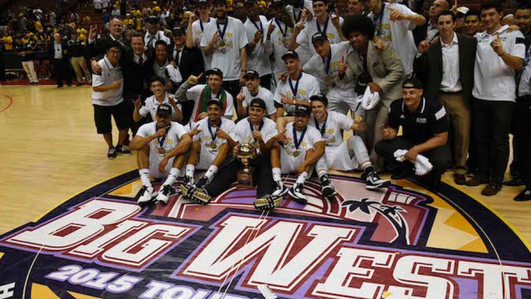 Mar 14, 2015; Anaheim, CA, USA; UC Irvine Anteaters celebrate after the game against the Hawaii Warriors in the Big West Conference Tournament championship game at Honda Center. The UC Irvine Anteaters won 67-58. Mandatory Credit: Kelvin Kuo-USA TODAY Sports