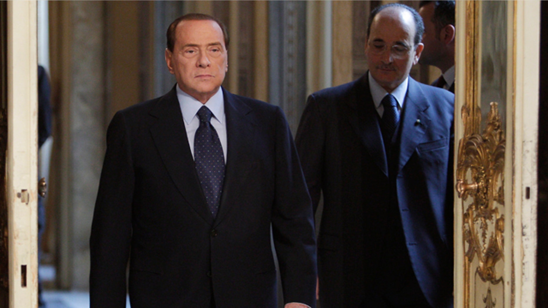 March 14: Italian premier Silvio Berlusconi arrives to meet European Commission president Jose Manuel Barroso, not in photo, at Palazzo Chigi in Rome. (AP)