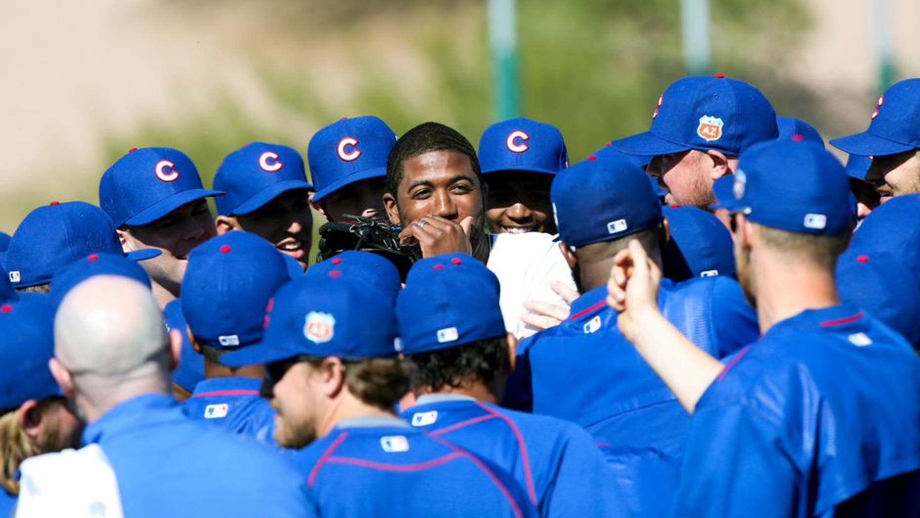 Dexter Fowler makes a surprise appearance during spring training at Sloan Park in Mesa, Ariz., on Thursday, Feb. 25, 2016, after Fowler agreed to a one-year contract with a mutual option with the Cubs. (Armando L. Sanchez/Chicago Tribune/TNS via Getty Images)