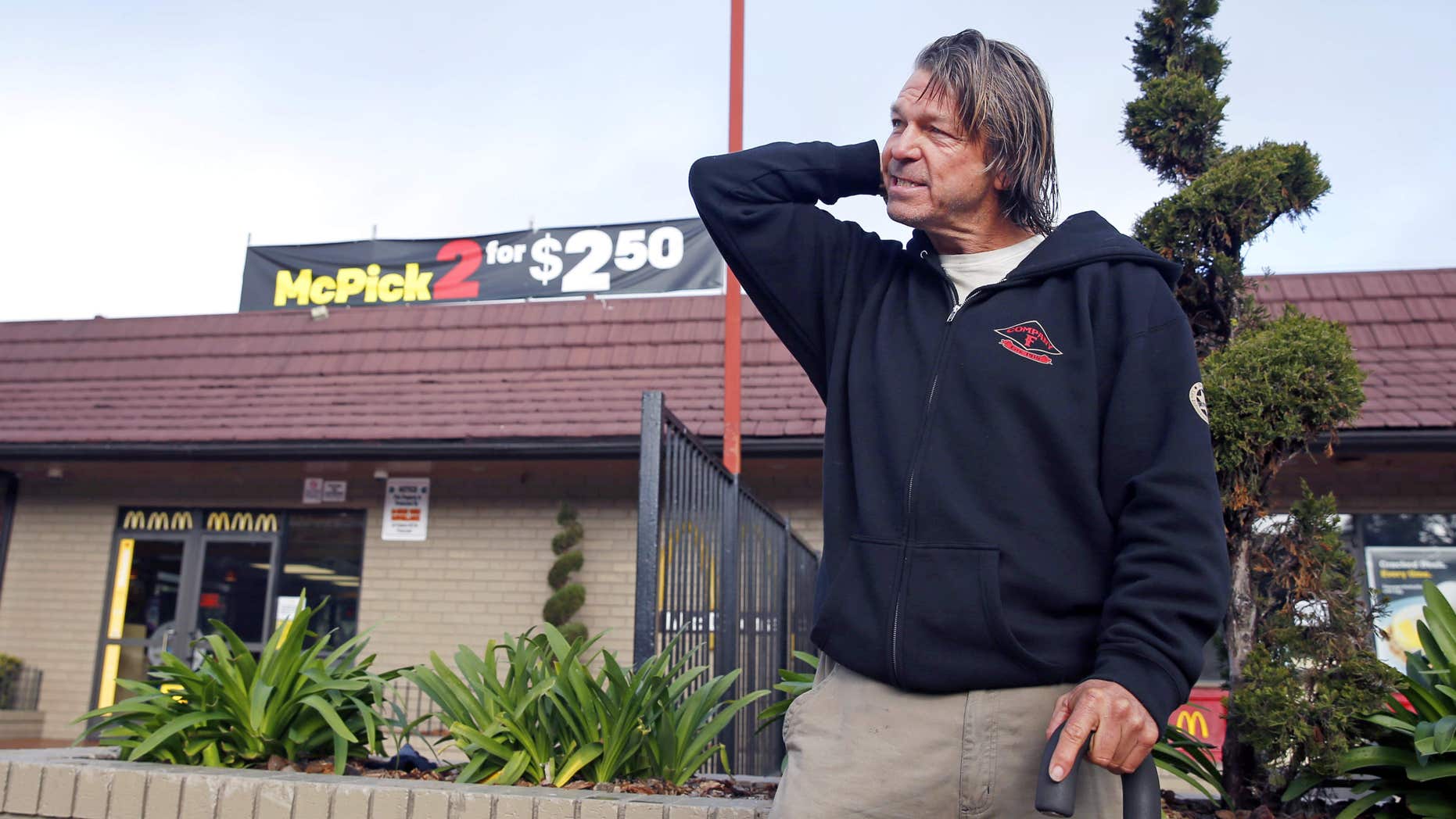 FILE - In this Feb. 2, 2016 file photo, Matthew Hay-Chapman returns to the McDonald's restaurant at Haight and Stanyan streets in San Francisco, to describe how he spotted two of the Orange County jail escapees that resulted in their capture.