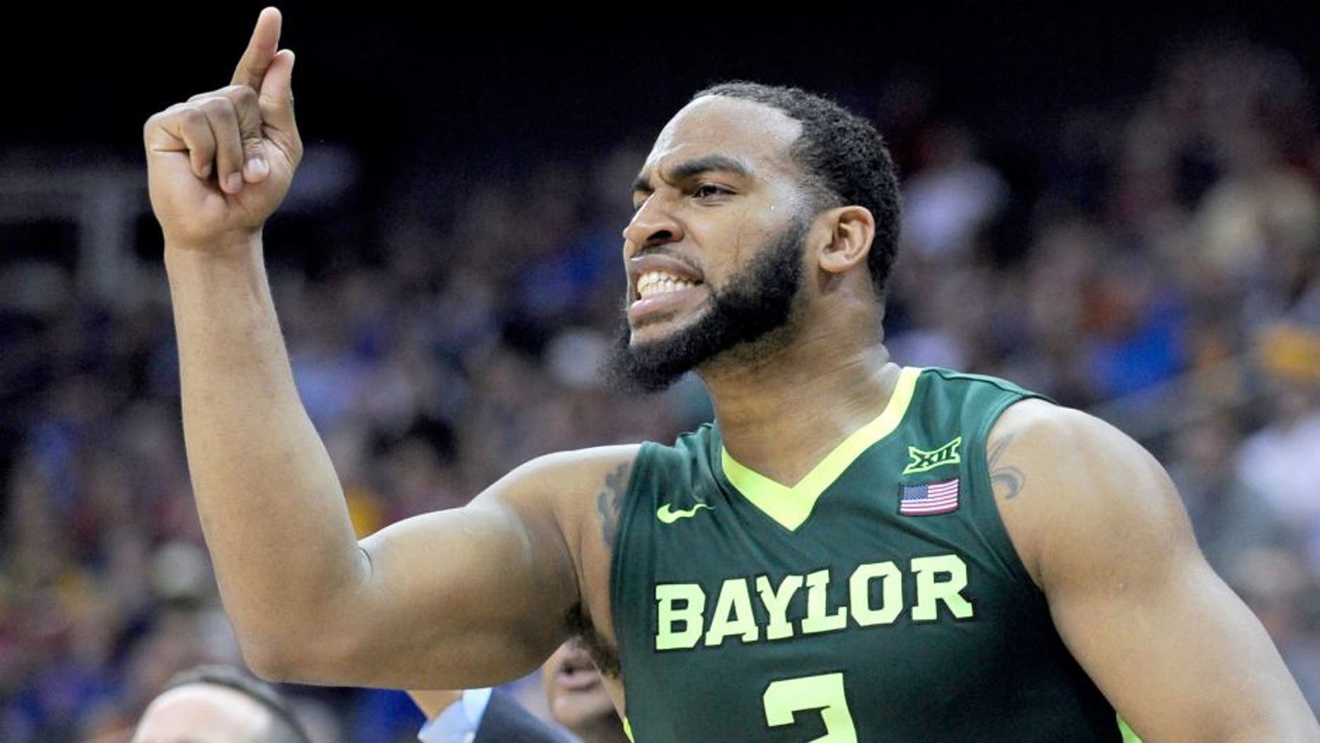 KANSAS CITY, MO - MARCH 10: Rico Gathers #2 of the Baylor Bears cheers on his team during a game against the Texas Longhorns in the second half during the quarterfinals of the Big 12 Basketball Tournament at Sprint Center on March 10, 2016 in Kansas City, Missouri. Baylor won 75-61. (Photo by Ed Zurga/Getty Images)