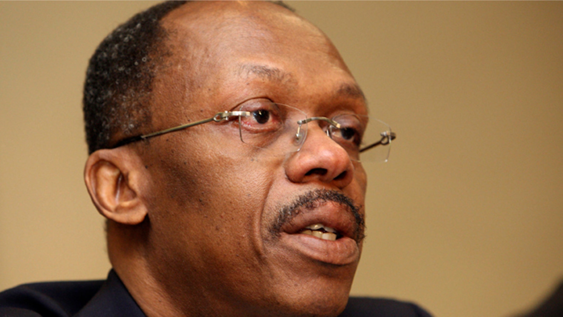 In this Jan. 15, 2010, file photo, Former Haitian President Jean-Bertrand Aristide speaks during a press conference in Johannesburg, South Africa.