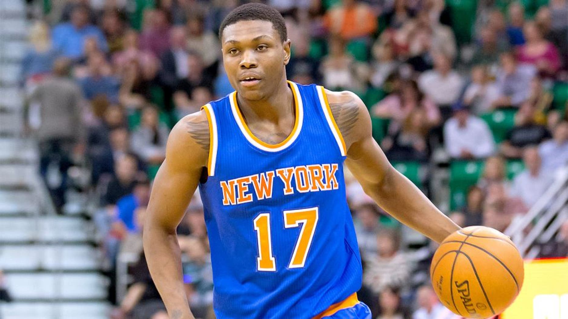 Mar 10, 2015; Salt Lake City, UT, USA; New York Knicks forward Cleanthony Early (17) dribbles the ball during the first half against the Utah Jazz at EnergySolutions Arena. The Jazz won 87-82. Mandatory Credit: Russ Isabella-USA TODAY Sports