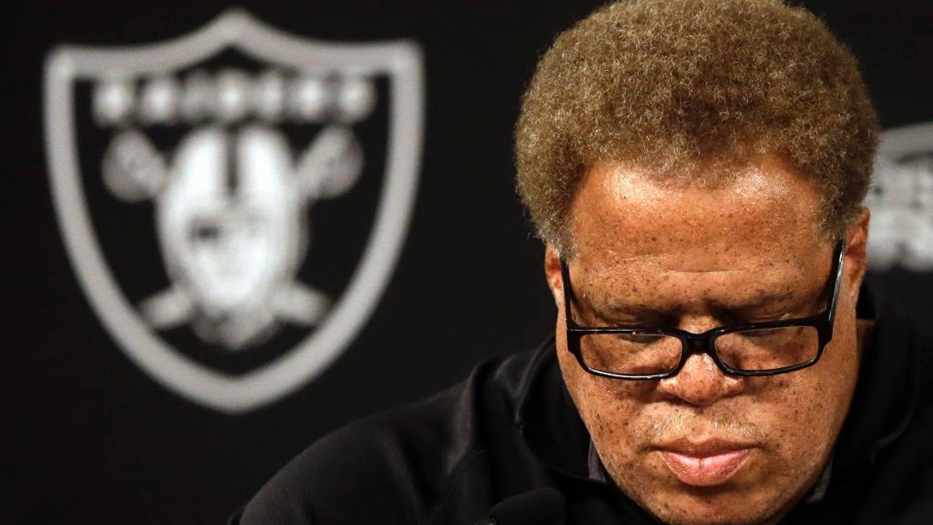 Oakland Raiders general manager Reggie McKenzie takes questions from reporters during a media conference Tuesday, Sept. 30, 2014, in Alameda, Calif. The Oakland Raiders named Tony Sparano as their interim head coach. (AP Photo/Ben Margot)