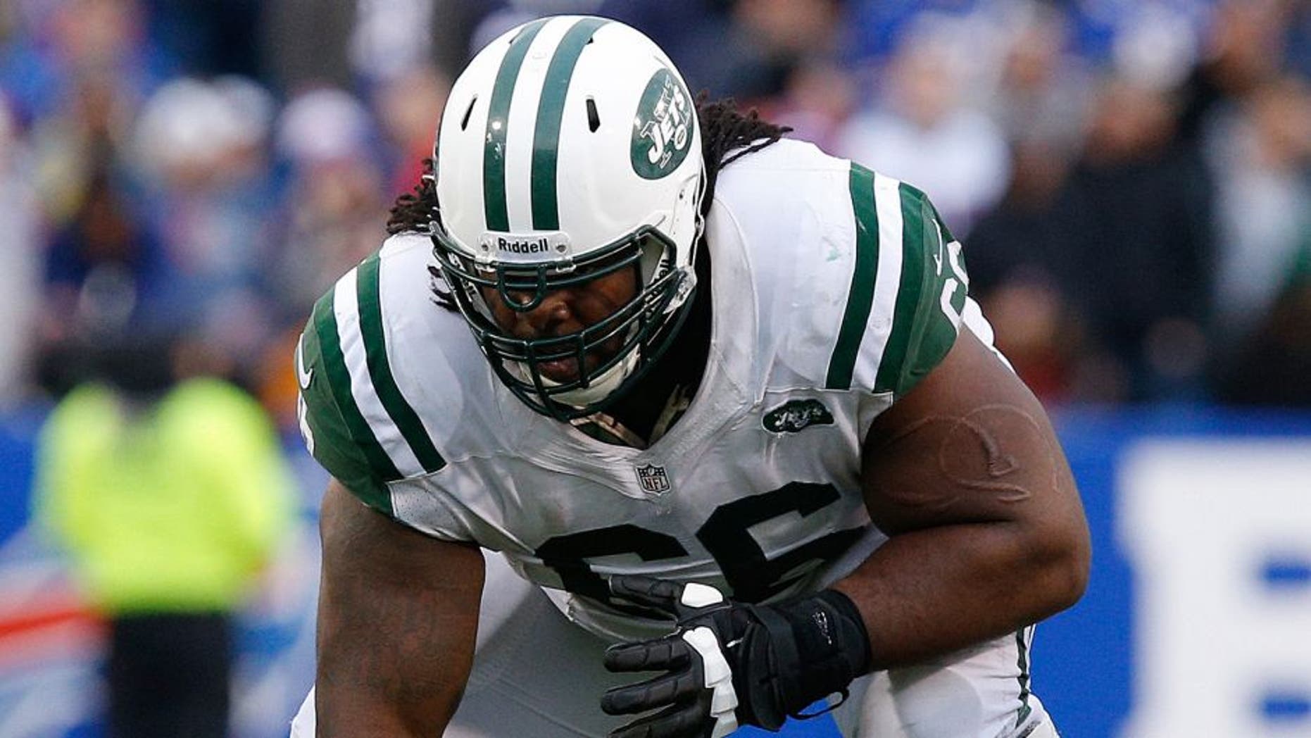 Nov 17, 2013; Orchard Park, NY, USA; New York Jets guard Willie Colon (66) during the second half against the Buffalo Bills at Ralph Wilson Stadium. Bills beat the Jets 37-14. Mandatory Credit: Kevin Hoffman-USA TODAY Sports