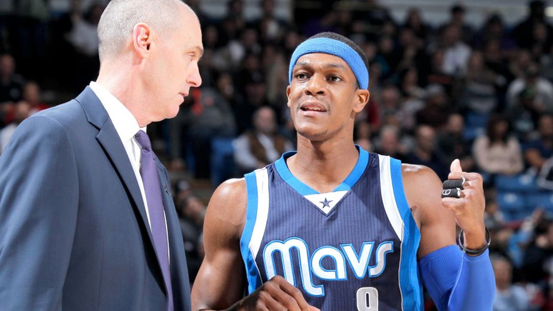 SACRAMENTO, CA - JANUARY 13: Head Coach Rick Carlisle of the Dallas Mavericks coaches Rajon Rondo #9 against the Sacramento Kings on January 13, 2015 at Sleep Train Arena in Sacramento, California. NOTE TO USER: User expressly acknowledges and agrees that, by downloading and or using this photograph, User is consenting to the terms and conditions of the Getty Images Agreement. Mandatory Copyright Notice: Copyright 2015 NBAE (Photo by Rocky Widner/NBAE via Getty Images)