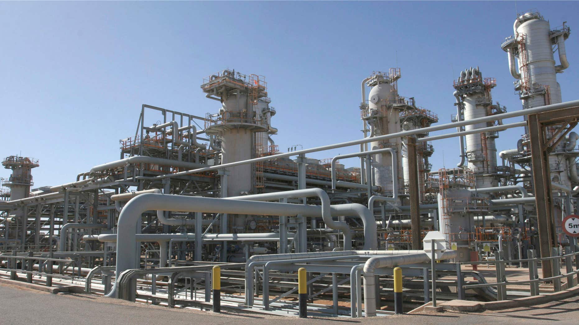 FILE - This Sunday, Dec. 14, 2008 file picture shows the Krechba gas plant on the In Salah gas field in Algeria's Sahara Desert, some 1,200 kilometers (720 miles) south of the capital, Algiers, Algeria.