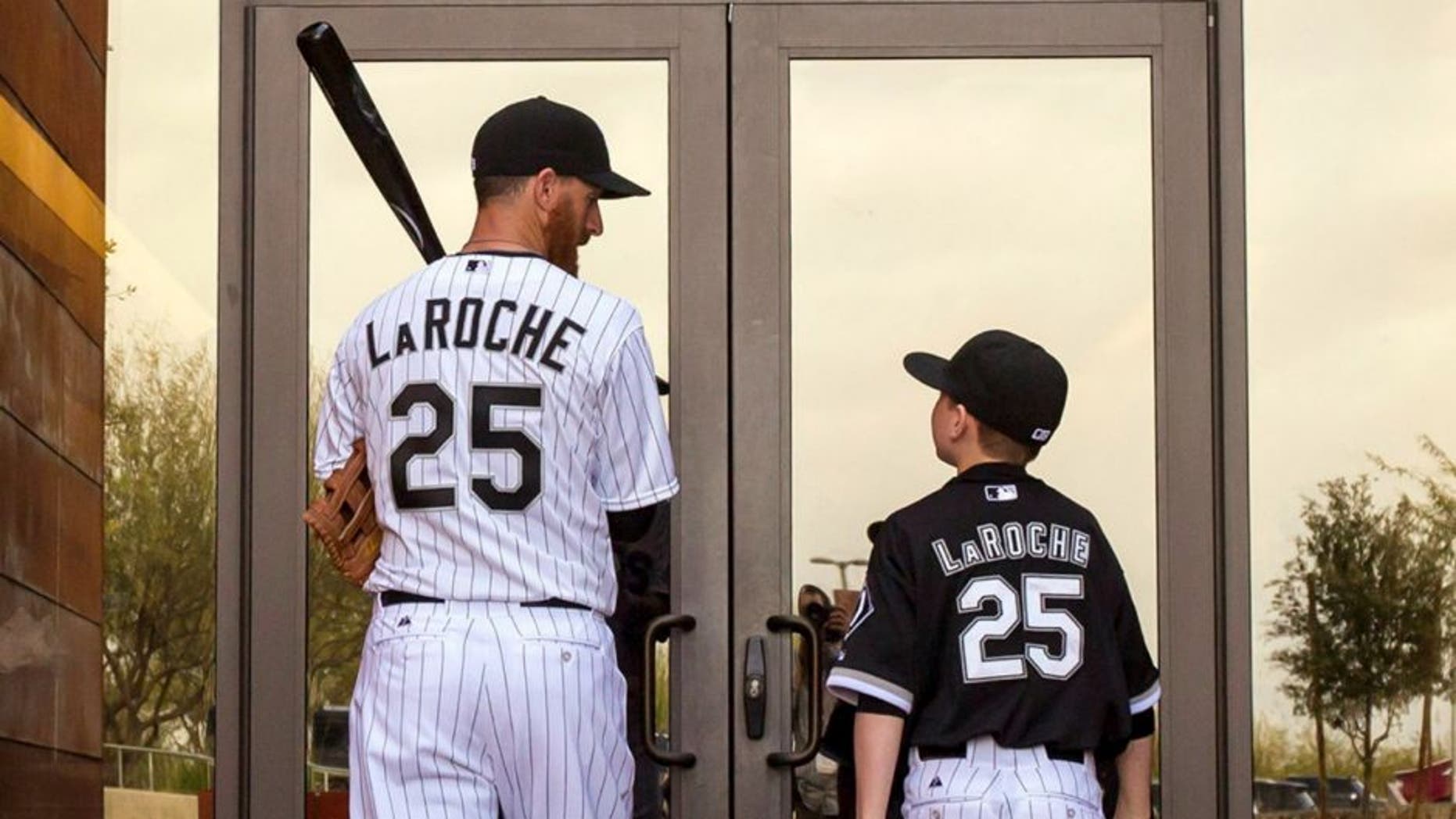 First baseman Adam LaRoche walks back into the clubhouse with his son Drake, 13, after photo day Saturday, Feb. 28, 2015 at Chicago White Sox spring training in Glendale, Ariz. (Brian Cassella/Chicago Tribune/TNS),First baseman Adam LaRoche walks back into the clubhouse with his son Drake, 13, after photo day Saturday, Feb. 28, 2015 at Chicago White Sox spring training in Glendale, Ariz. (Brian Cassella/Chicago Tribune/TNS via Getty Images)