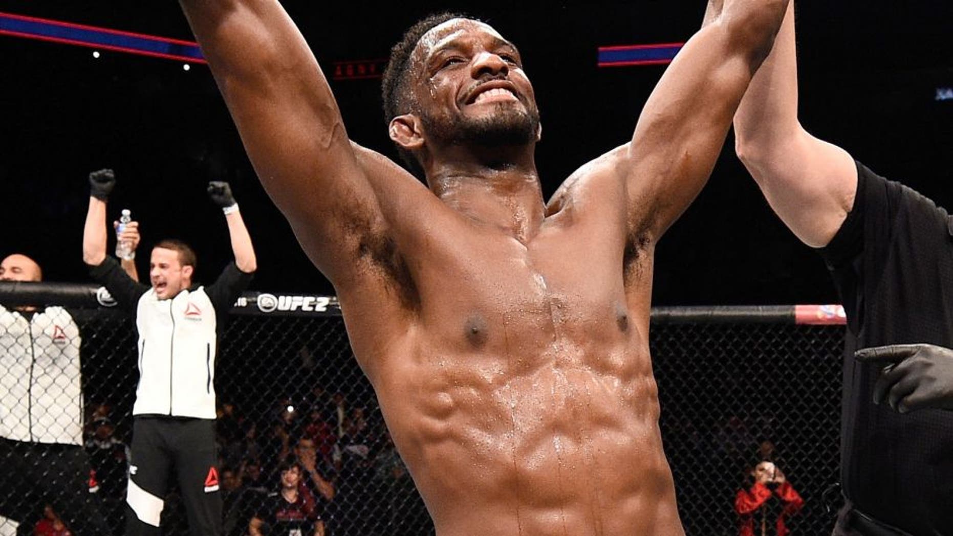 MONTERREY, MEXICO - NOVEMBER 21: Neil Magny of the United States celebrates after his split-decision victory over Kelvin Gastelum of the United States in their welterweight bout during the UFC Fight Night event at Arena Monterrey on November 21, 2015 in Monterrey, Mexico. (Photo by Jeff Bottari/Zuffa LLC/Zuffa LLC via Getty Images)