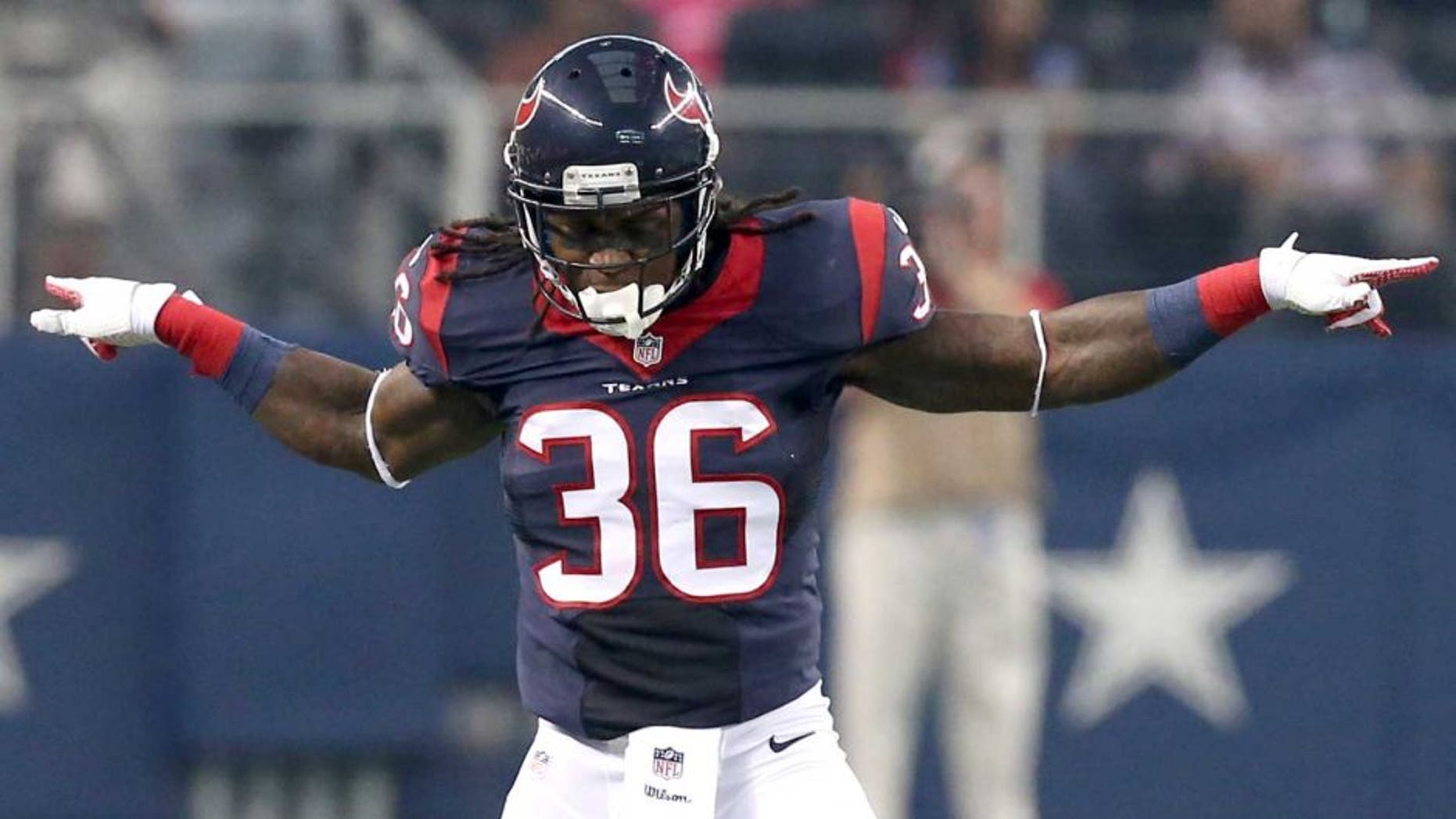 Aug 29, 2013; Arlington, TX, USA; Houston Texans safety D.J. Swearinger (36) celebrates after stopping Dallas Cowboys tight end James Hanna (84) after a third down stop in the first quarter at AT&T Stadium. Mandatory Credit: Matthew Emmons-USA TODAY Sports