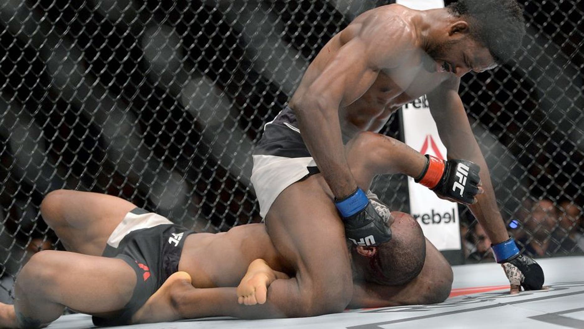 BRISBANE, AUSTRALIA - MARCH 20: Neil Magny dominates against Hector Lombard during their UFC Welterweight Bout at UFC Brisbane on March 20, 2016 in Brisbane, Australia. (Photo by Bradley Kanaris/Getty Images)