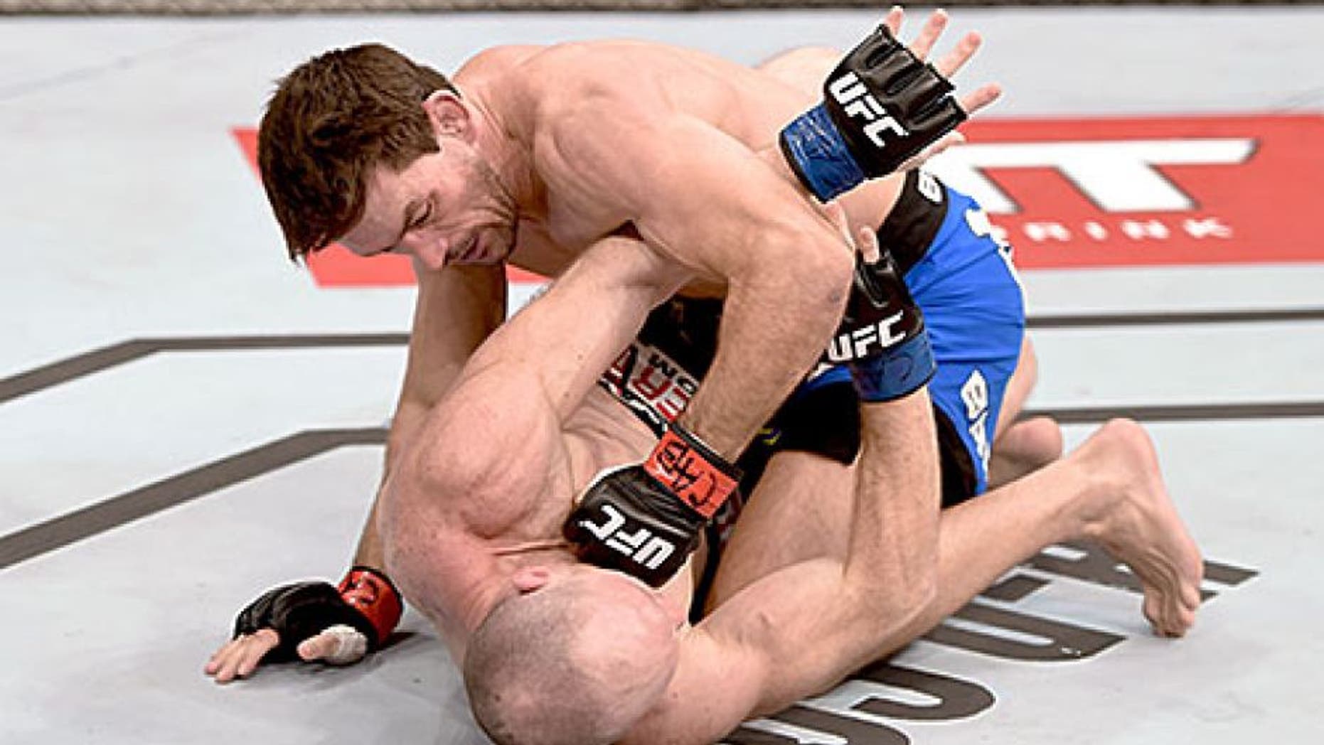 RIO DE JANEIRO, BRAZIL - MARCH 21: Demian Maia of Brazil punches Ryan LaFlare of the United States in their welterweight bout during the UFC Fight Night at Maracanazinho Gymnasium on March 21, 2015 in Rio de Janeiro, Brazil. (Photo by Buda Mendes/Zuffa LLC/Zuffa LLC via Getty Images)