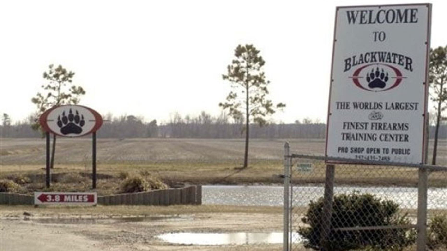 In this Feb. 20, 2004 file photo, signs welcome visitors to the private North Carolina-based security company Blackwater USA's headquarters near Moyock, N.C. (AP).