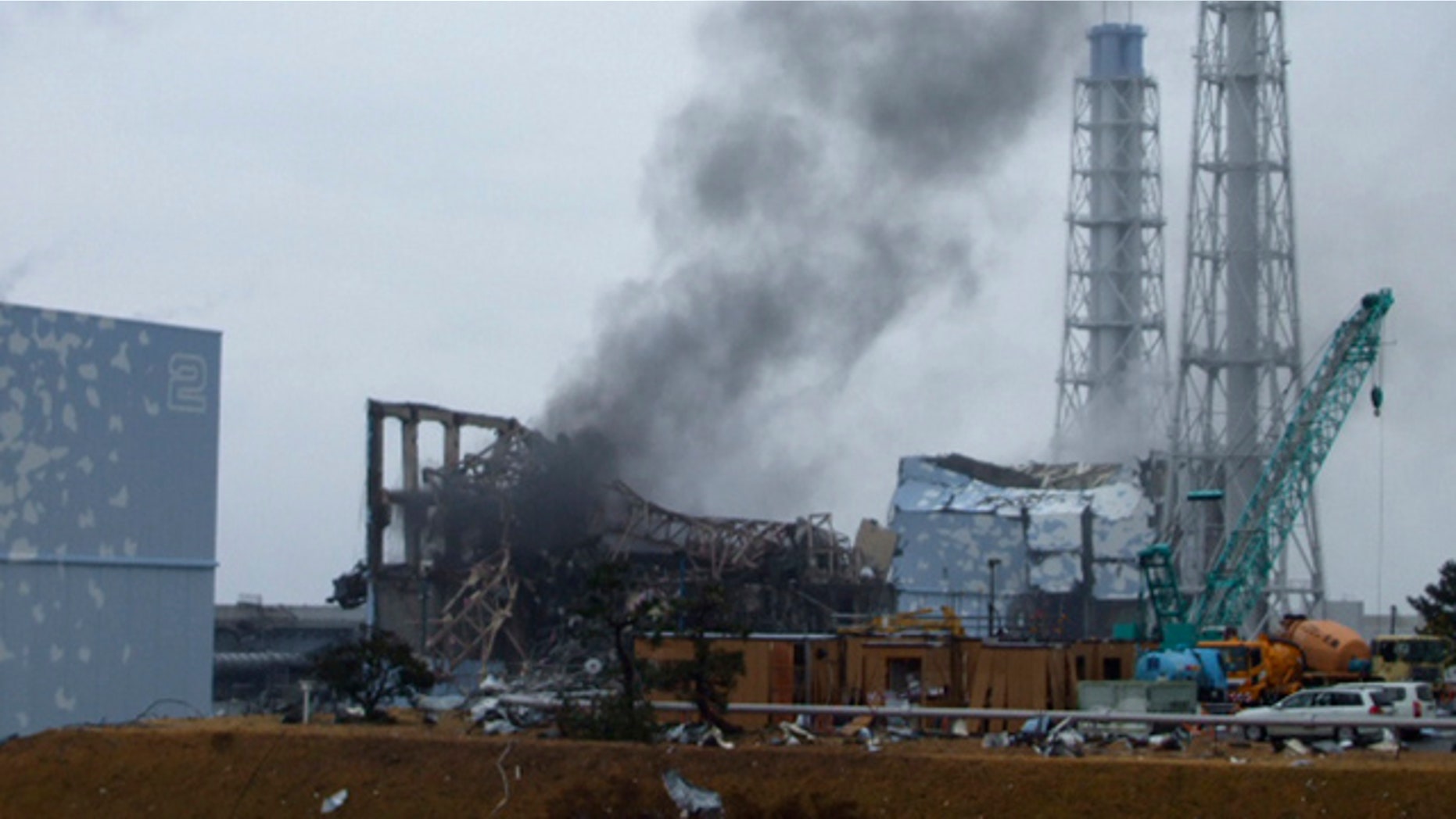 March 21: In this photo released by Tokyo Electric Power Co. (TEPCO), gray smoke rises from Unit 3 of the tsunami-stricken Fukushima Dai-ichi nuclear power plant in Okumamachi, Fukushima Prefecture, Japan.