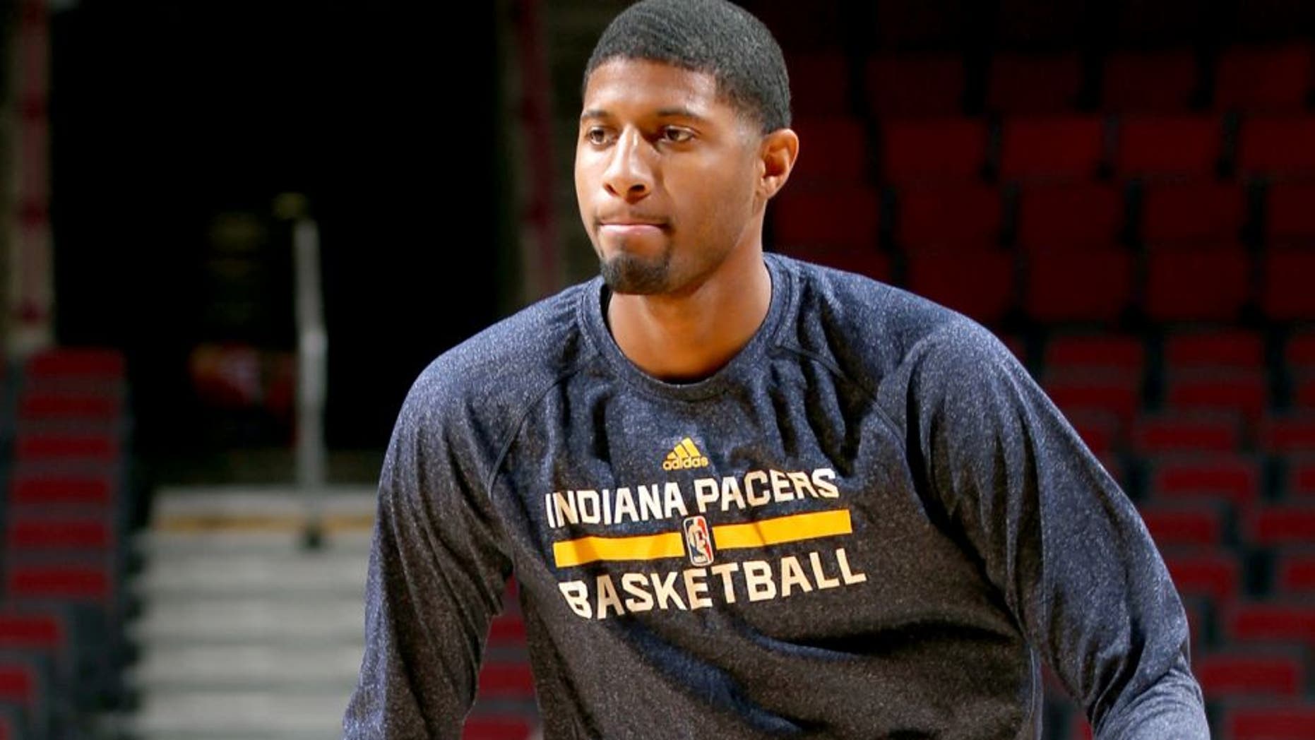 CHICAGO, IL - MARCH 18: Paul George #13 of the Indiana Pacers warms up before a game against the Chicago Bulls on March 18, 2015 at the United Center in Chicago, Illinois. NOTE TO USER: User expressly acknowledges and agrees that, by downloading and or using this Photograph, user is consenting to the terms and conditions of the Getty Images License Agreement. Mandatory Copyright Notice: Copyright 2015 NBAE (Photo by Joe Murphy/NBAE via Getty Images)