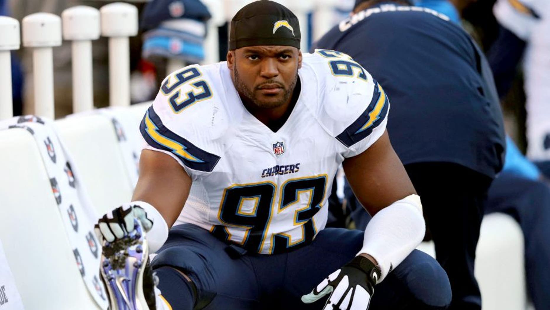 Nov 30, 2014; Baltimore, MD, USA; San Diego Chargers defensive end Dwight Freeney (93) stretches on the sidelines during the game against the Baltimore Ravens at M&T Bank Stadium. Mandatory Credit: Mitch Stringer-USA TODAY Sports