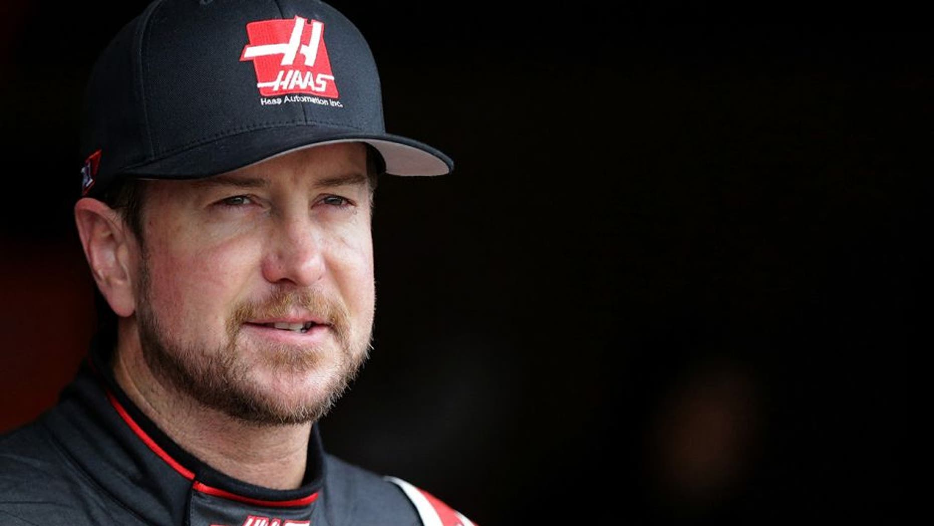 FONTANA, CA - MARCH 19: Kurt Busch, driver of the #41 Haas Automation/Monster Energy Chevrolet, stands in the garage area during practice for the NASCAR Sprint Cup Series Auto Club 400 at Auto Club Speedway on March 19, 2016 in Fontana, California. (Photo by Jeff Gross/Getty Images)