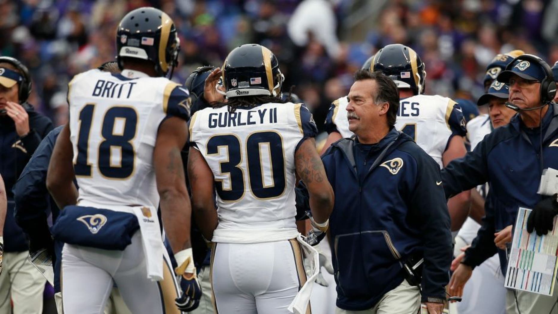 BALTIMORE, MD - NOVEMBER 22: Running back Todd Gurley #30 of the St. Louis Rams celebrates after scoring a first quarter touchdown against the Baltimore Ravens with wide receiver Kenny Britt #18 of the St. Louis Rams and head coach Jeff Fisher of the St. Louis Rams at M&T Bank Stadium on November 22, 2015 in Baltimore, Maryland. (Photo by Rob Carr/Getty Images)