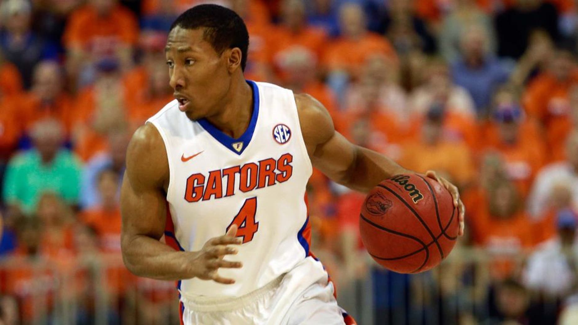 Mar 1, 2016; Gainesville, FL, USA; Florida Gators guard KeVaughn Allen (4) drives to the basket against the Kentucky Wildcats during the first half at Stephen C. O'Connell Center. Mandatory Credit: Kim Klement-USA TODAY Sports