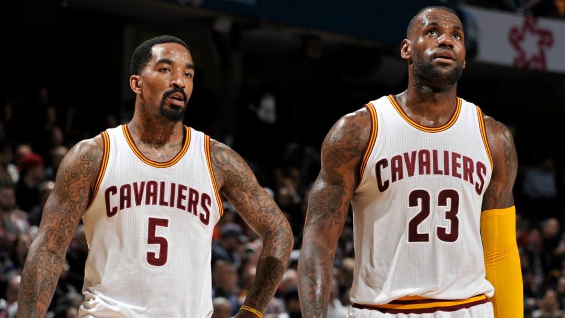 CLEVELAND, OH - MARCH 7: J.R. Smith #5 and LeBron James #23 of the Cleveland Cavaliers during the game against the Memphis Grizzlies on March 7, 2016 at Quicken Loans Arena in Cleveland, Ohio. NOTE TO USER: User expressly acknowledges and agrees that, by downloading and or using this Photograph, user is consenting to the terms and conditions of the Getty Images License Agreement. Mandatory Copyright Notice: Copyright 2016 NBAE (Photo by David Kyle Liam/NBAE via Getty Images)