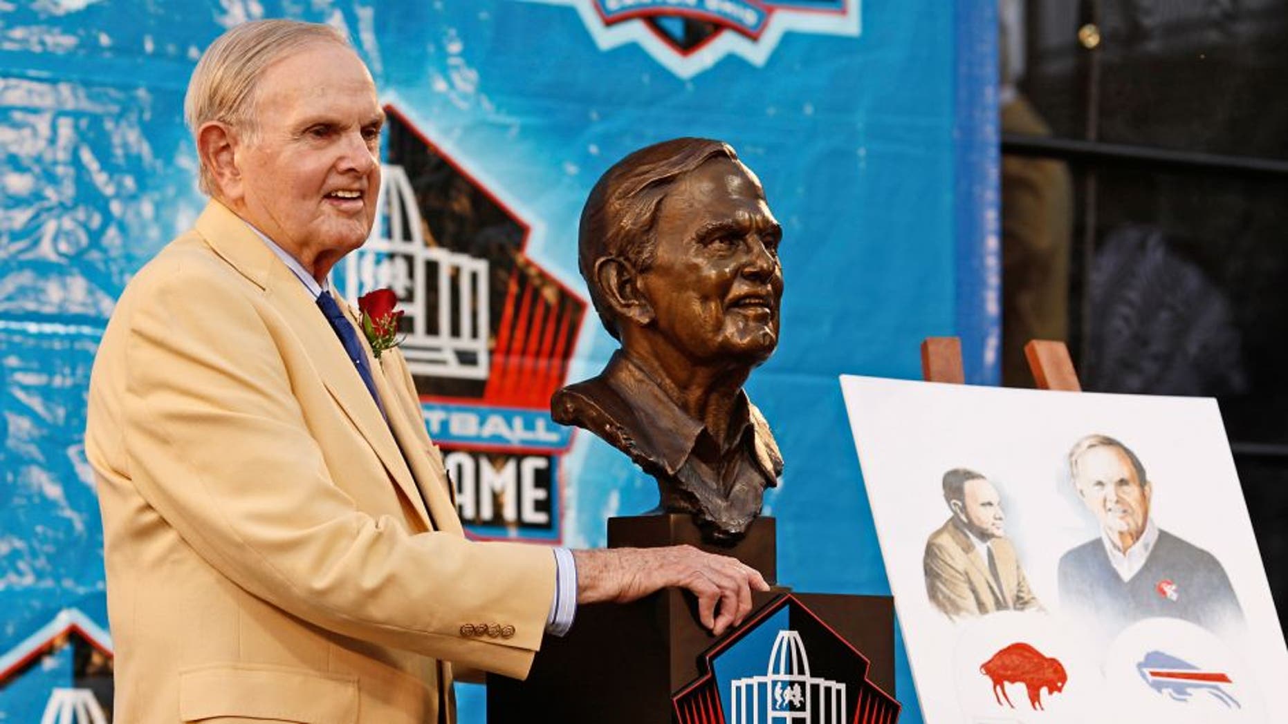 CANTON, OH - AUGUST 8: Buffalo Bills founder Ralph Wilson Jr. poses with his bust at his induction into the Pro Football Hall of Fame during the 2009 enshrinement ceremony at Fawcett Stadium on August 8, 2009 in Canton, Ohio. (Photo by Joe Robbins/Getty Images)