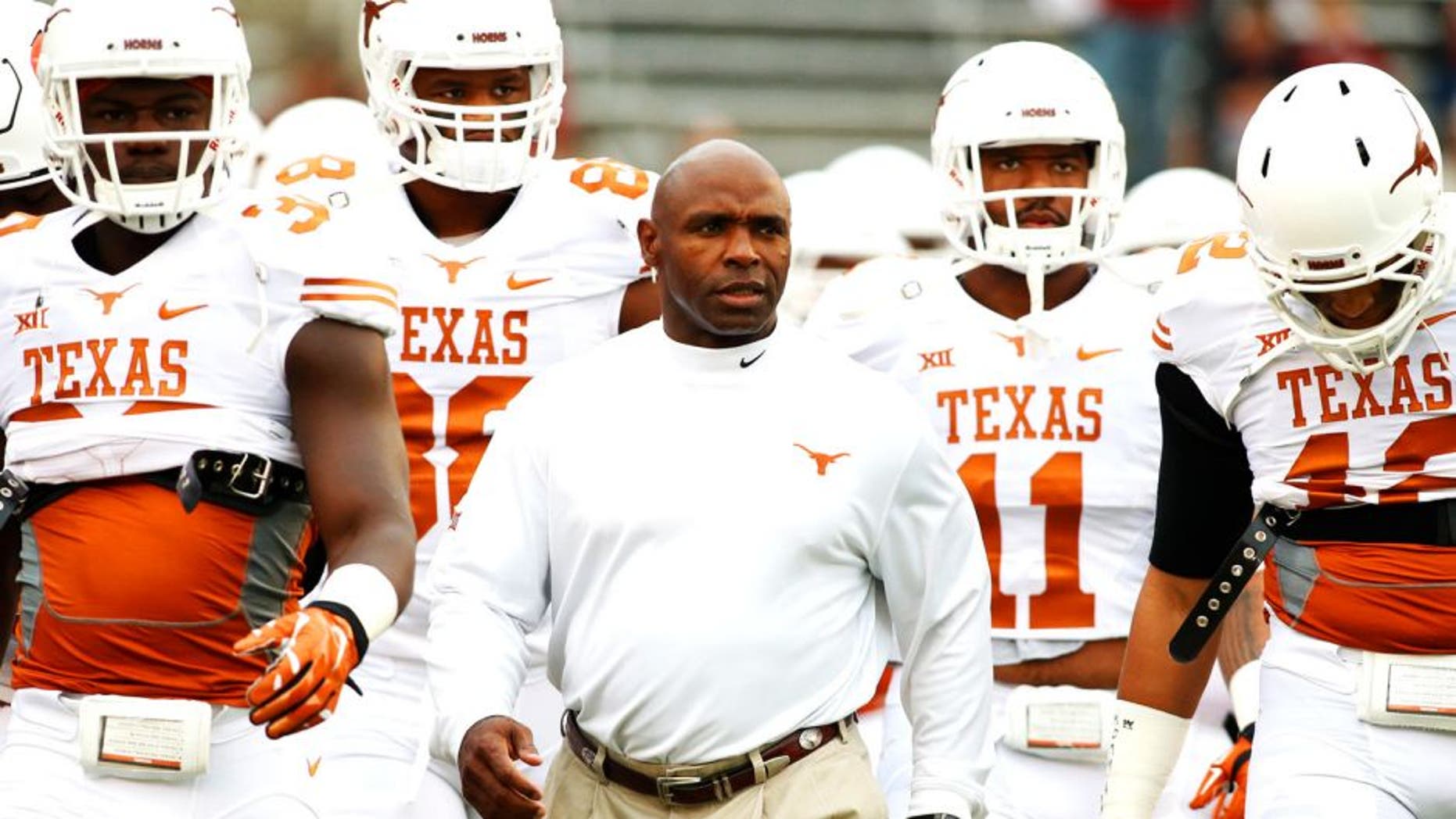 Oct 11, 2014; Dallas, TX, USA; Texas Longhorns head coach Charlie Strong takes the field with his team before the game against the Oklahoma Sooners at the Cotton Bowl. Mandatory Credit: Tim Heitman-USA TODAY Sports