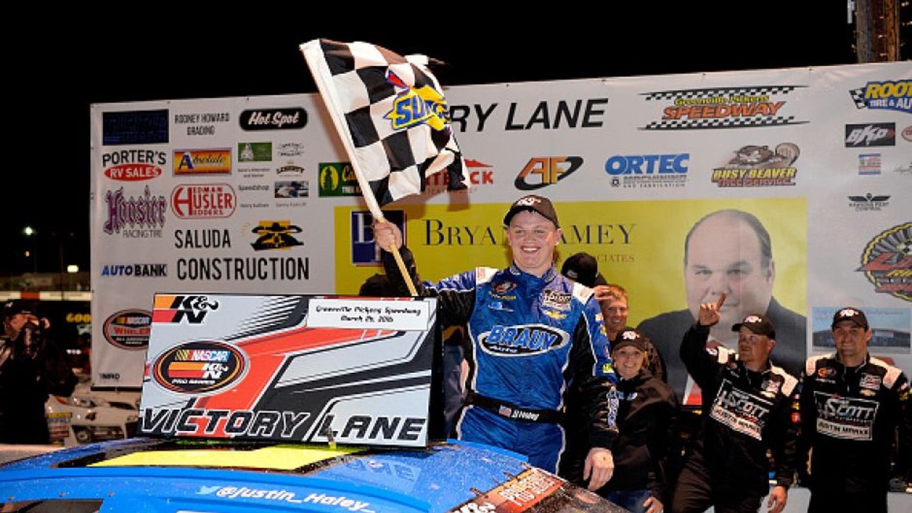 GREENVILLE, SC - MARCH 26: Justin Haley, driver of the #5 Braun Auto Chevrolet, celebrates in Victory Lane after winning the NASCAR K&N Pro Series East Kevin Whitaker Chevrolet 150 at Greenville Pickens Speedway on March 26, 2016 in Greenville, South Carolina. (Photo by Grant Halverson/NASCAR via Getty Images)