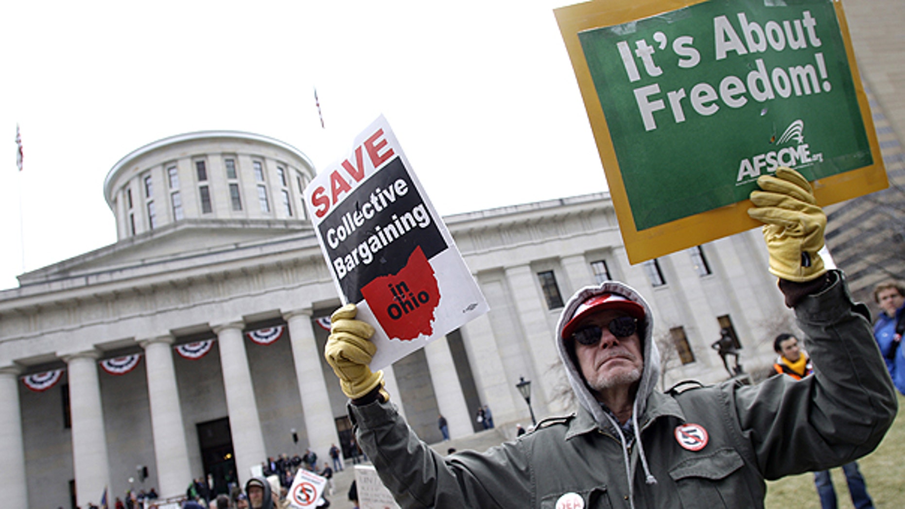 March 29: Tom Fagan, of Dayton, protests against Senate Bill 5 at the Ohio statehouse in Columbus, Ohio.