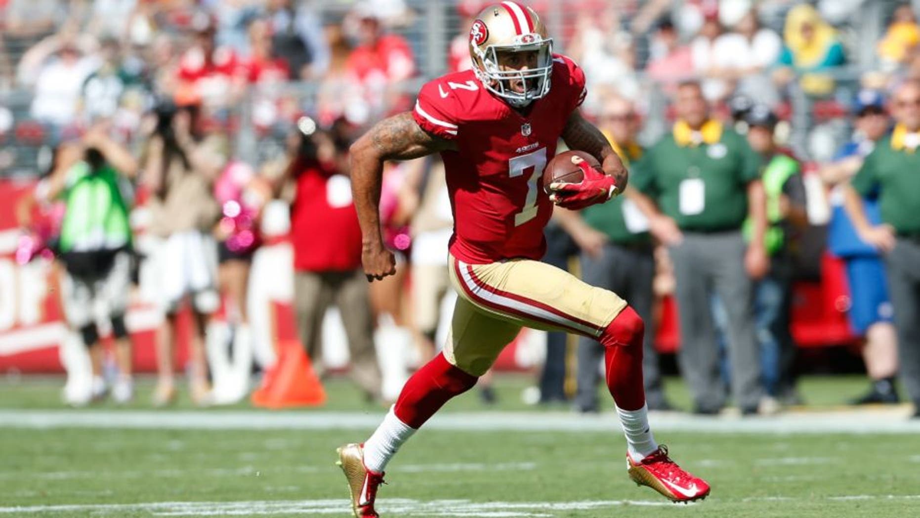 SANTA CLARA, CA - OCTOBER 4: Colin Kaepernick #7 of the San Francisco 49ers scrambles during the game against the Green Bay Packers at Levi Stadium on October 4, 2015 in Santa Clara, California. The Packers defeated the 49ers 17-3. (Photo by Michael Zagaris/San Francisco 49ers/Getty Images) *** Local Caption *** Colin Kaepernick,SANTA CLARA, CA - OCTOBER 4: Colin Kaepernick #7 of the San Francisco 49ers scrambles during the game against the Green Bay Packers at Levi Stadium on October 4, 2015 in Santa Clara, California. The Packers defeated the 49ers 17-3. (Photo by Michael Zagaris/San Francisco 49ers/Getty Images)