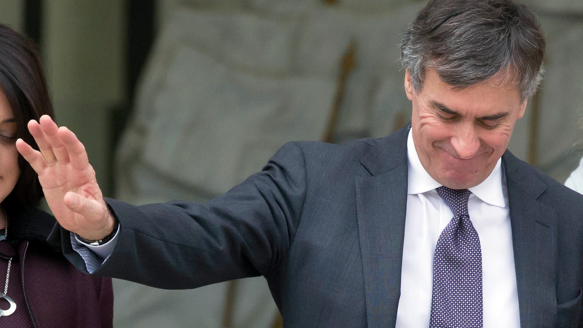 France's Budget Minister Jerome Cahuzac, reacts to journalists questions, as he leaves the weekly cabinet meeting at the Elysee Palace in Paris, Wednesday, Jan. 9, 2013. The Paris prosecutors office says it is opening a preliminary investigation into allegations that France's budget minister hid money from French tax authorities in offshore accounts. A statement Tuesday from the prosecutors office said it also intends to open a probe for defamation based on a complaint over the allegations filed by Budget Minister Jerome Cahuzac. (AP Photo/Michel Euler)