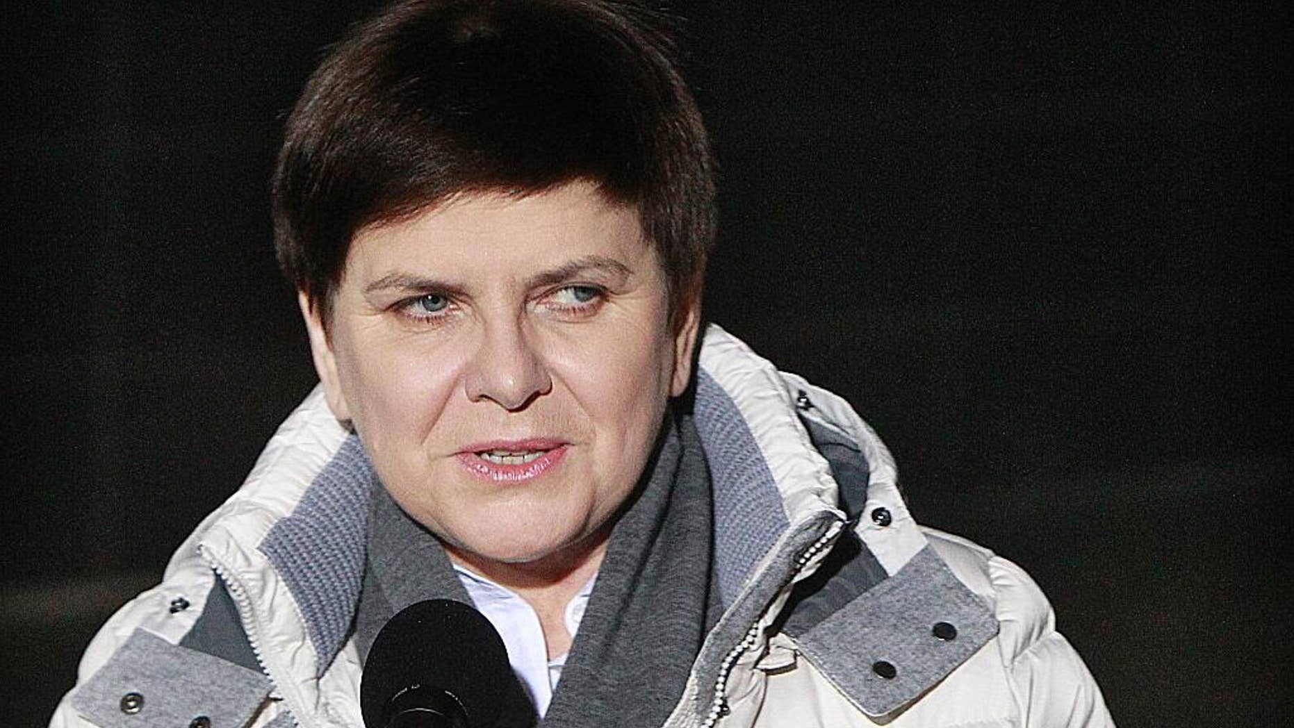 Poland's Prime Minister Beata Szydlo leaves hospital after being hospitalized for a week following a car crash in Warsaw, Poland, Friday Feb. 17, 2017. Szydlo suffered minor injuries when the car she was traveling in swerved to avoid another car and hit a tree in the Polish town of Oswiecim on Feb. 10, 2017. (AP Photo/Czarek Sokolowski)