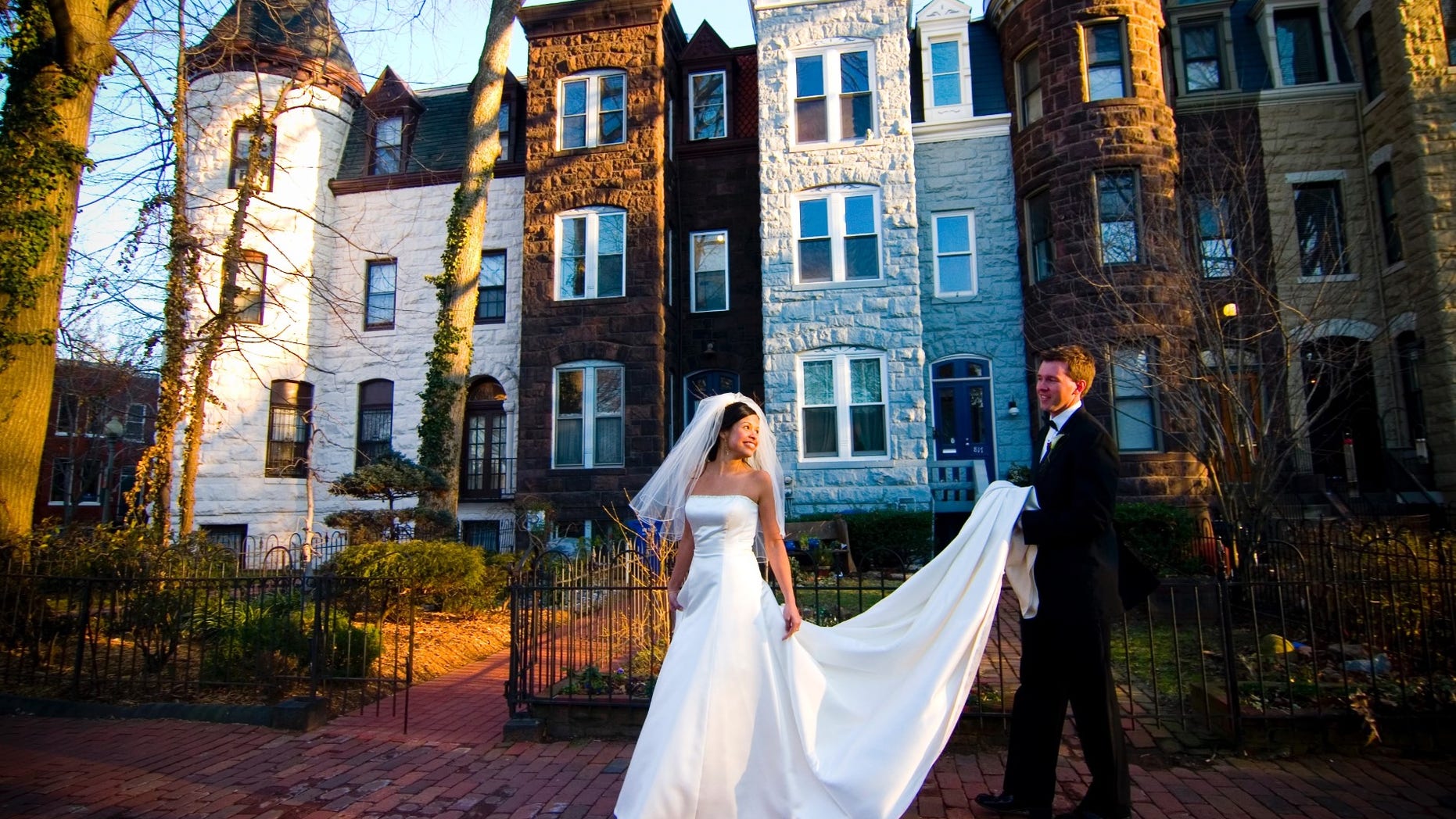 Joshua Rogers and his wife, Raquel, on their wedding day.