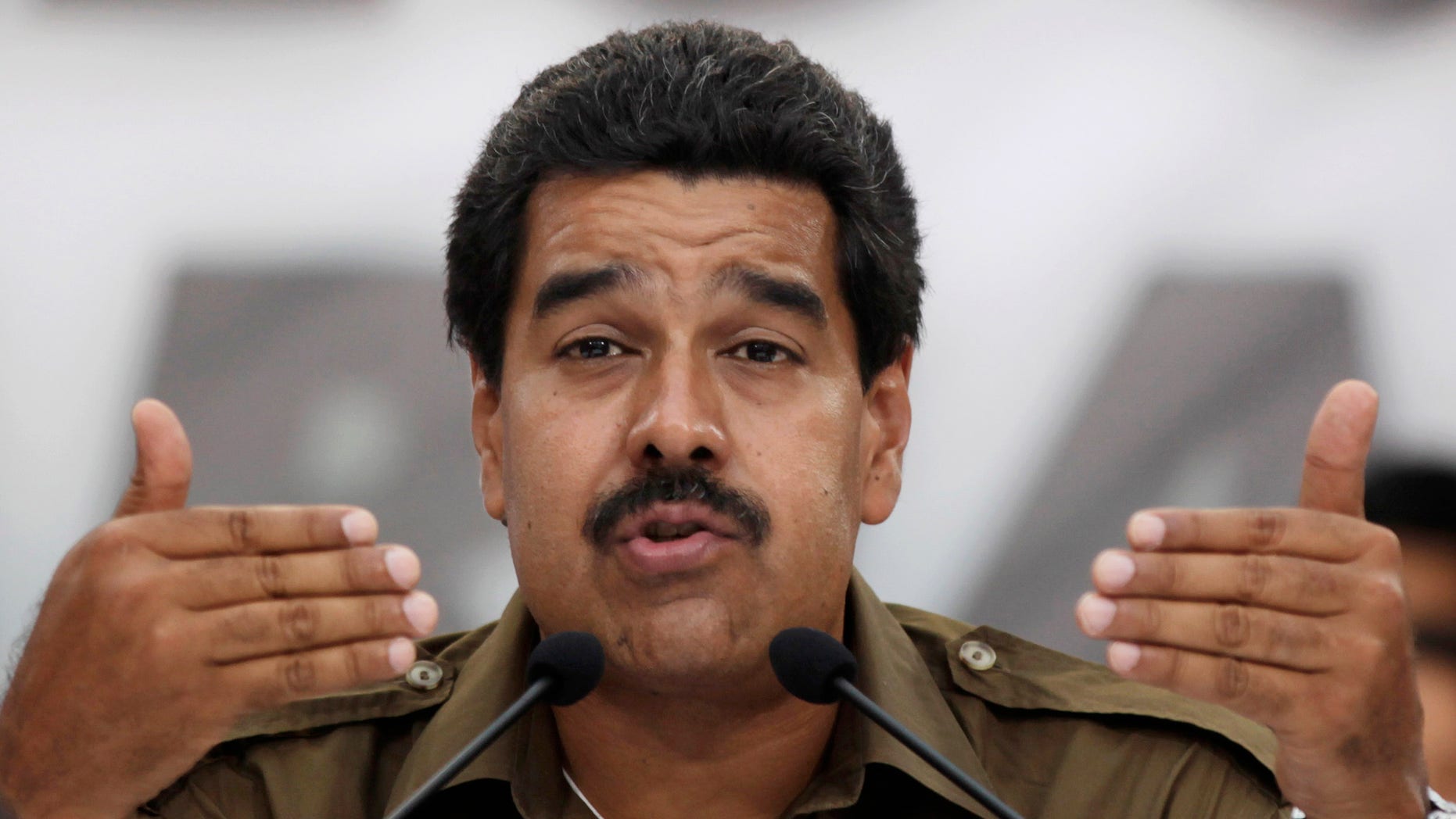 Venezuela's acting President Nicolas Maduro speaks during an event at the Casa Nacional de las Letras Andres Bello, where independence hero Simon Bolivar started his studies, in Caracas, Venezuela, Monday, April 1, 2013. Both Nicolas Maduro, Chavez's chosen successor, and opposition Gov. Henrique Capriles face the challenge of spelling out a vision for a future without Chavez, who dominated this 28 million-person country like few other leaders have during his 14 years in power. Venezuela will hold a presidential election on April 14. (AP Photo/Ariana Cubillos)