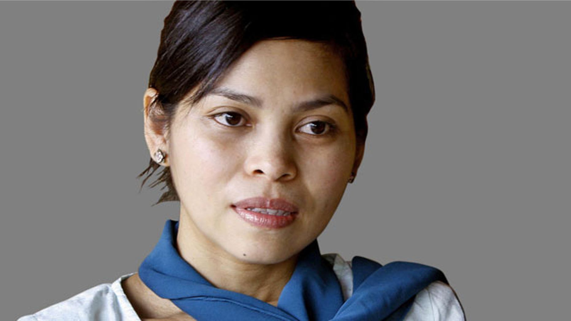 Muslim model, Kartika Sari Dewi Shukarno, who faced caning for drinking beer in Karai, Malaysia.