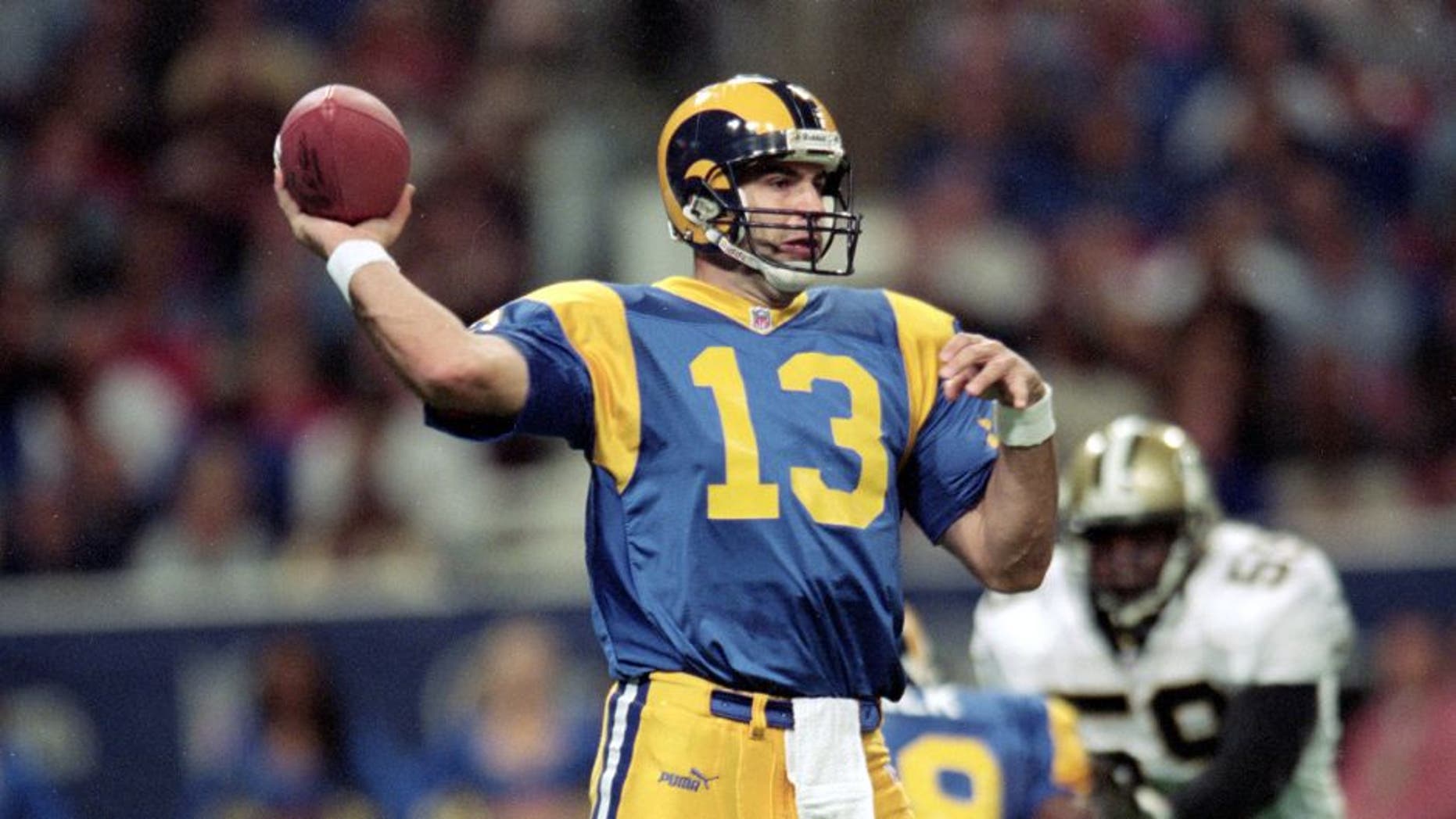 28 Nov 1999: Kurt Warner #13 of the St. Louis Rams passes the ball during a game against the New Orleans Saints at the Trans World Dome in St. Louis, Missouri. The Rams defeated the Saints 43-12. Mandatory Credit: Elsa Hasch /Allsport