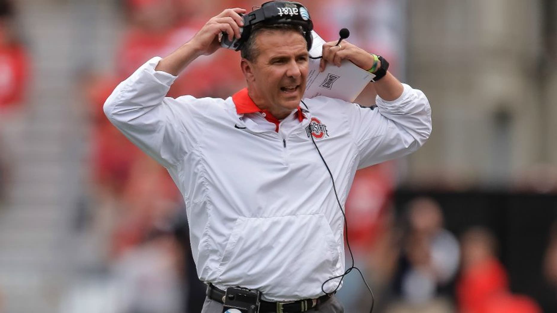 COLUMBUS, OH - SEPTEMBER 26: Head Coach Urban Meyer of the Ohio State Buckeyes watches his team play against the Western Michigan Broncos at Ohio Stadium on September 26, 2015 in Columbus, Ohio. (Photo by Jamie Sabau/Getty Images)