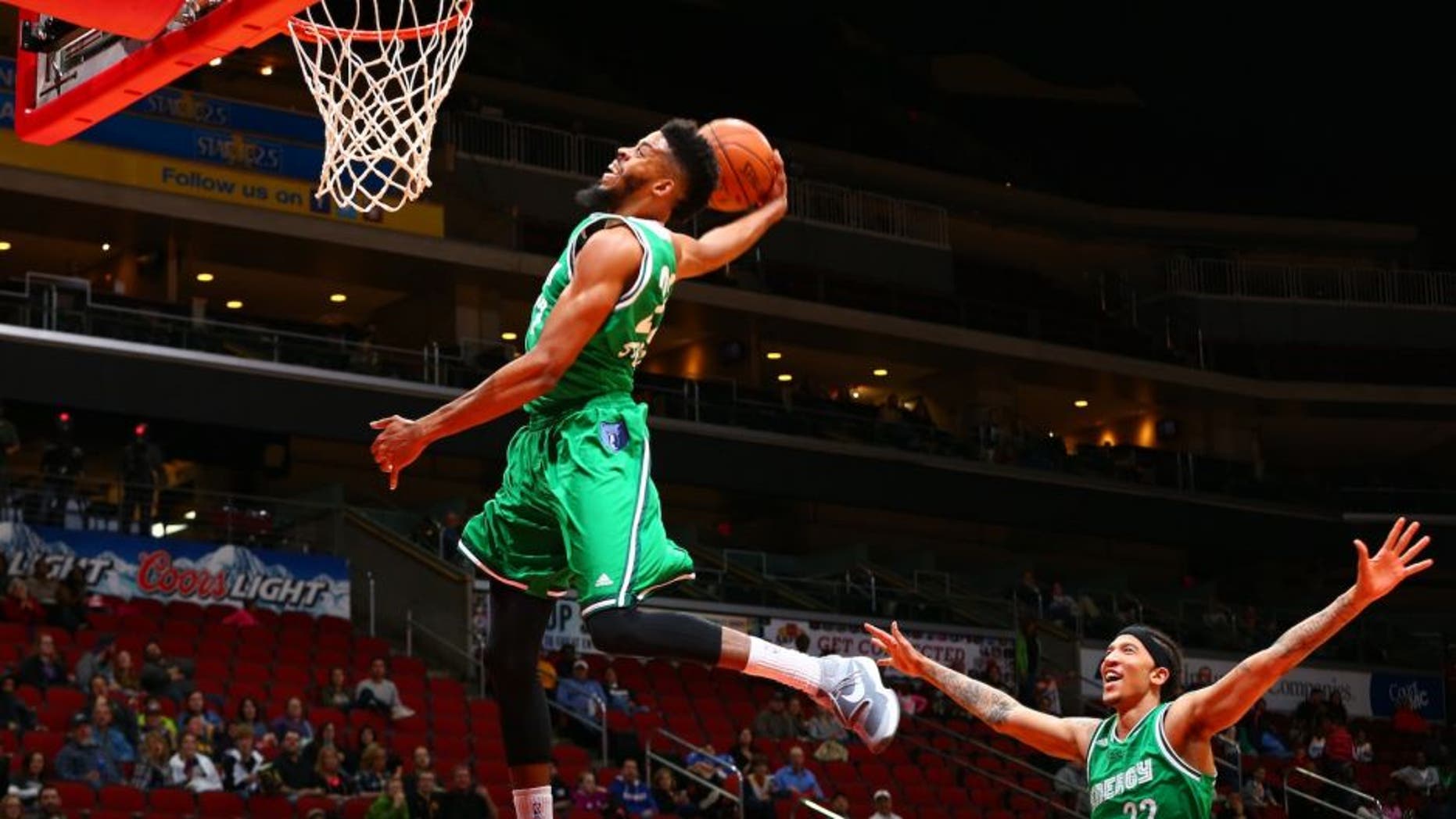 DES MOINES, IA - MARCH 26: DJ Stephens #23 of the Iowa Energy winds up for a dunk while Maxie Esho #22 of the Iowa Energy celebrates in an NBA D-League game on March 26, 2016 at the Wells Fargo Arena in Des Moines, Iowa. NOTE TO USER: User expressly acknowledges and agrees that, by downloading and or using this Photograph, user is consenting to the terms and conditions of the Getty Images License Agreement. Mandatory Copyright Notice: Copyright 2016 NBAE (Photo by Jason Bradwell/NBAE via Getty Images)