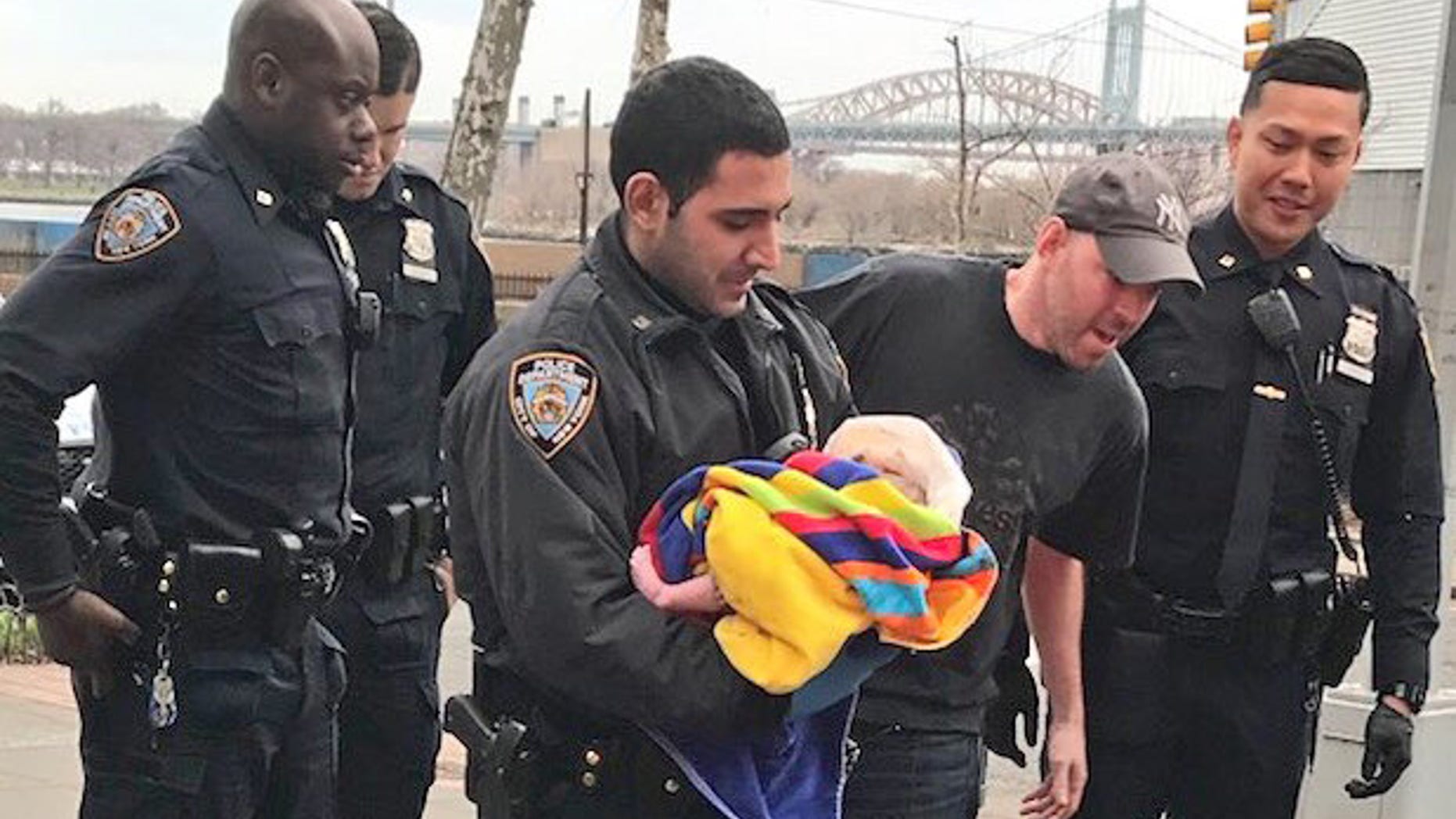 NYPD cops on Easter Sunday helped deliver a baby on the city's Upper East Side in the front seat of a car.